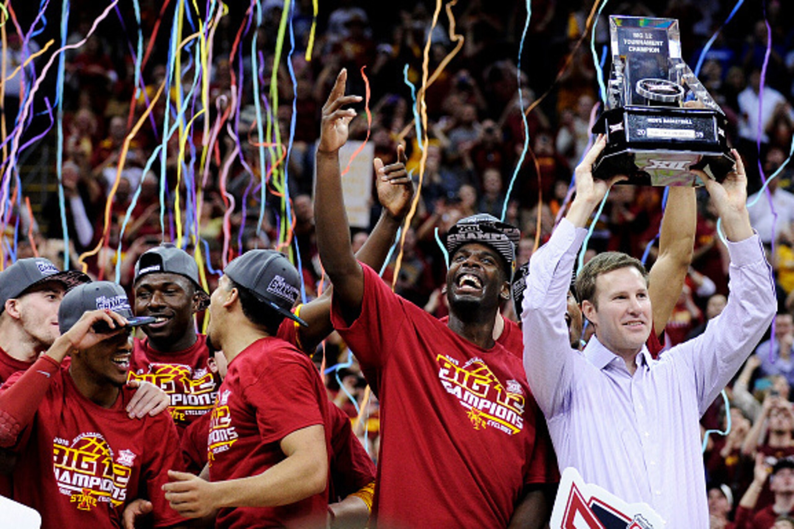 KANSAS CITY, MO - MARCH 14:  The Iowa State Cyclones celebrate with the trophy after their 70 to 66 win over the Kansas Jayhawks during the championship game of the Big 12 Basketball Tournament at Sprint Center on March 14, 2015 in Kansas City, Missouri. 