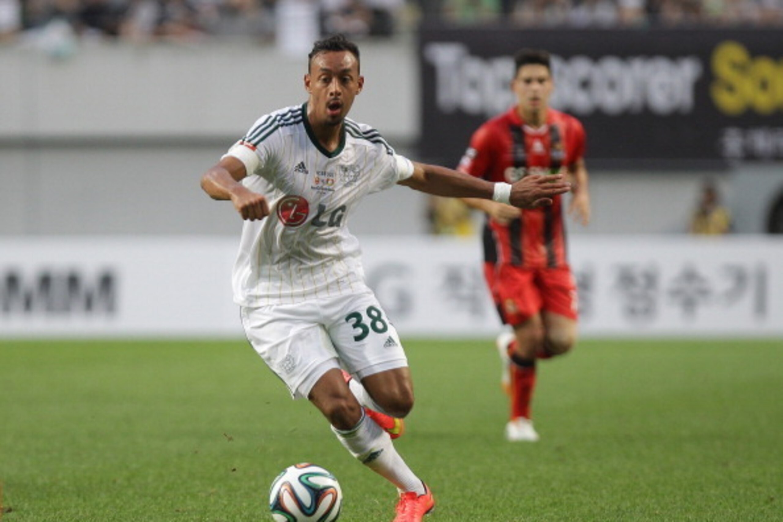 SEOUL, SOUTH KOREA - JULY 30:  Karim Bellarabi of Bayer Leverkusen controls the ball during the match between Bayer Leverkusen and FC Seoul as a part of Bayer Leverkusen's Korean Tour 2014 on July 30, 2014 in Seoul, South Korea.  (Photo by Chung Sung-Jun/