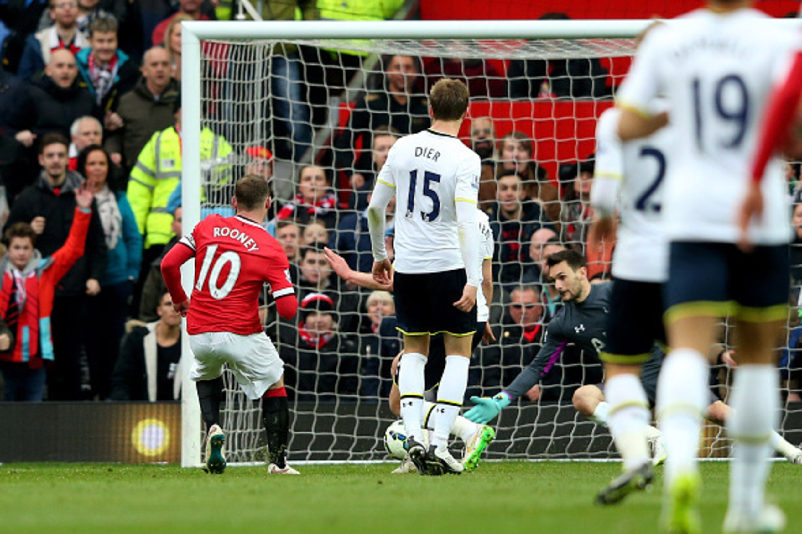 MANCHESTER, ENGLAND - MARCH 15:  Wayne Rooney of Manchester United scores his team's third goal during the Barclays Premier League match between Manchester United and Tottenham Hotspur at Old Trafford on March 15, 2015 in Manchester, England.  (Photo by A