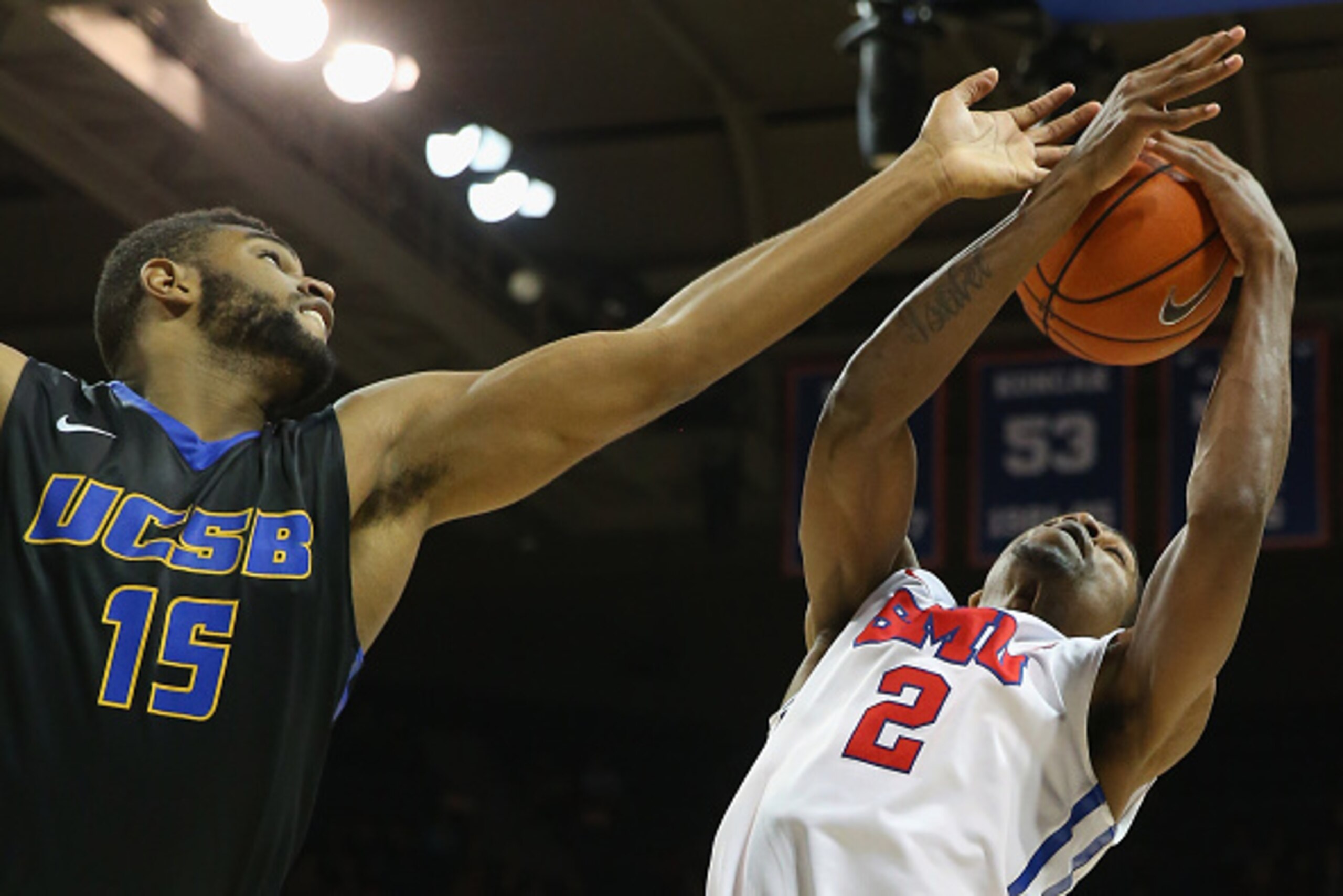 DALLAS, TX - DECEMBER 08:  Alan Williams #15 of the UC Santa Barbara Gauchos and Yanick Moreira #2 of the Southern Methodist Mustangs at Moody Coliseum on December 8, 2014 in Dallas, Texas.  (Photo by Ronald Martinez/Getty Images)