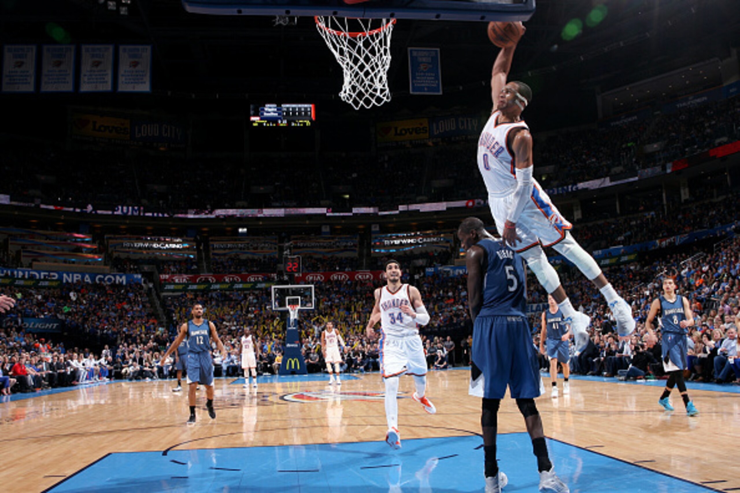 OKLAHOMA CITY, OK - MARCH 13: Russell Westbrook #0 of the Oklahoma City Thunder dunks against the Minnesota Timberwolves on March 13, 2015 at the Chesapeake Energy Arena in Oklahoma City, Oklahoma. NOTE TO USER: User expressly acknowledges and agrees that