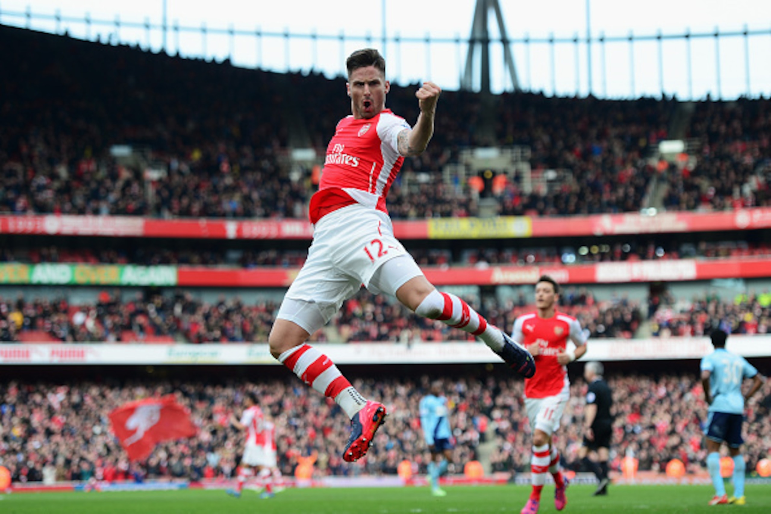 LONDON, ENGLAND - MARCH 14: Olivier Giroud of Arsenal celebrates scoring the opening goal during the Barclays Premier League match between Arsenal and West Ham United at Emirates Stadium on March 14, 2015 in London, England. (Photo by Jamie McDonald/Get LONDON, ENGLAND - MARCH 14: Olivier Giroud of Arsenal celebrates scoring the opening goal during the Barclays Premier League match between Arsenal and West Ham United at Emirates Stadium on March 14, 2015 in London, England. (Photo by Jamie McDonald/Get