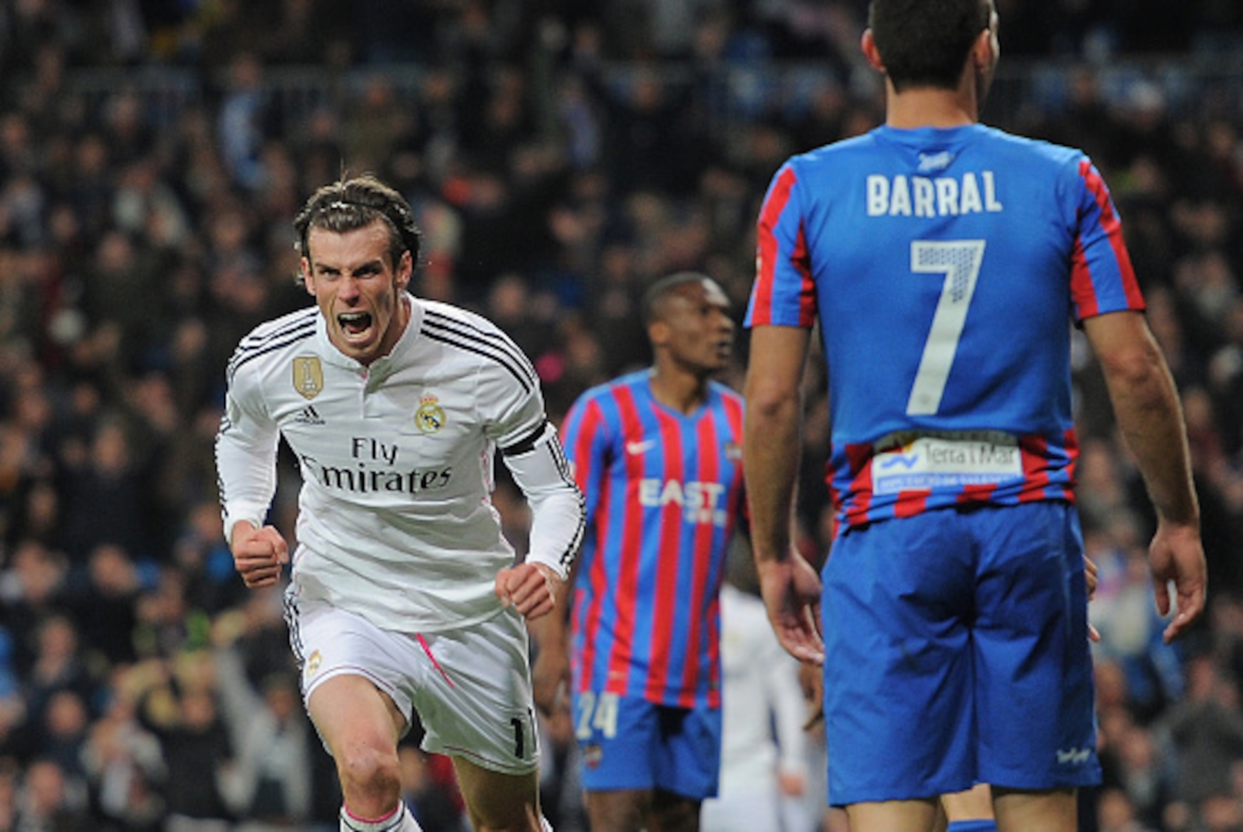 MADRID, SPAIN - MARCH 15:  Gareth Bale of Real Madrid celebrates after scoring Real's opening goal during the La Liga match between Real Madrid CF and Levante UD at Estadio Santiago Bernabeu on March 15, 2015 in Madrid, Spain.  (Photo by Denis Doyle/Getty