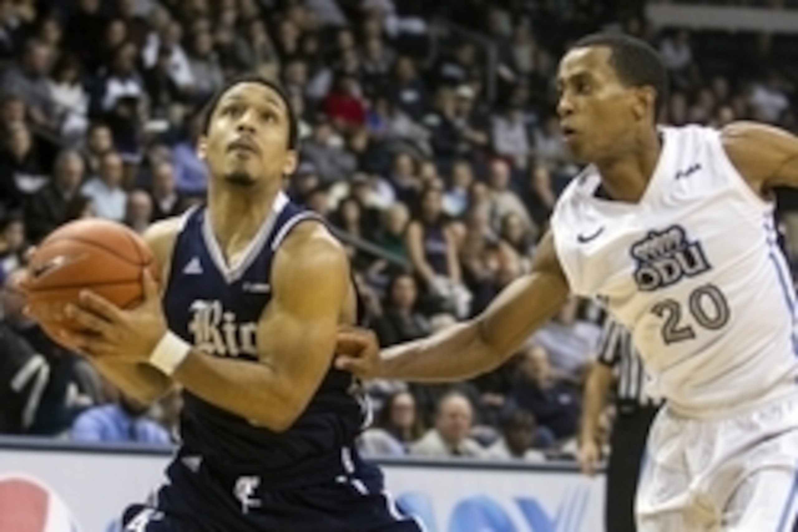 Jan 15, 2015; Norfolk, VA, USA; Rice Owls guard Max Guercy (1) drives to the basket against Old Dominion Monarchs guard Trey Freeman (20) during the first half at Constant Convocation Center. Mandatory Credit: Peter Casey-USA TODAY Sports