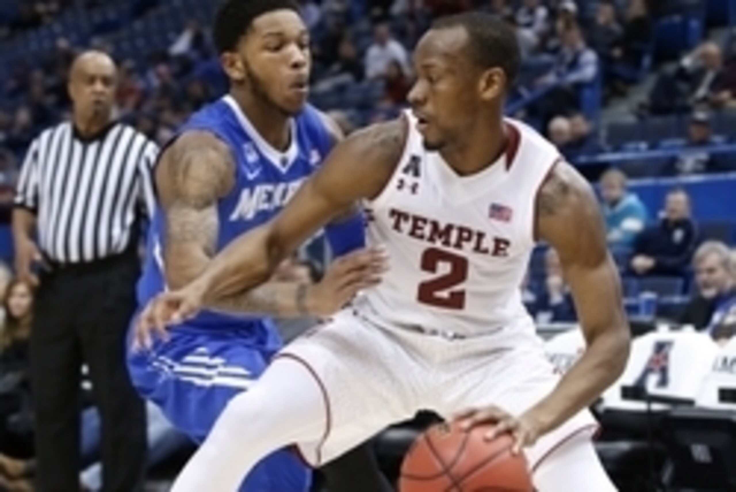 Mar 13, 2015; Hartford, CT, USA; Temple Owls guard Will Cummings (2) works the ball against Memphis Tigers guard Markel Crawford (1) in the second half during the quarterfinal round of the American Conference Tournament at XL Center. Temple defeated Memph