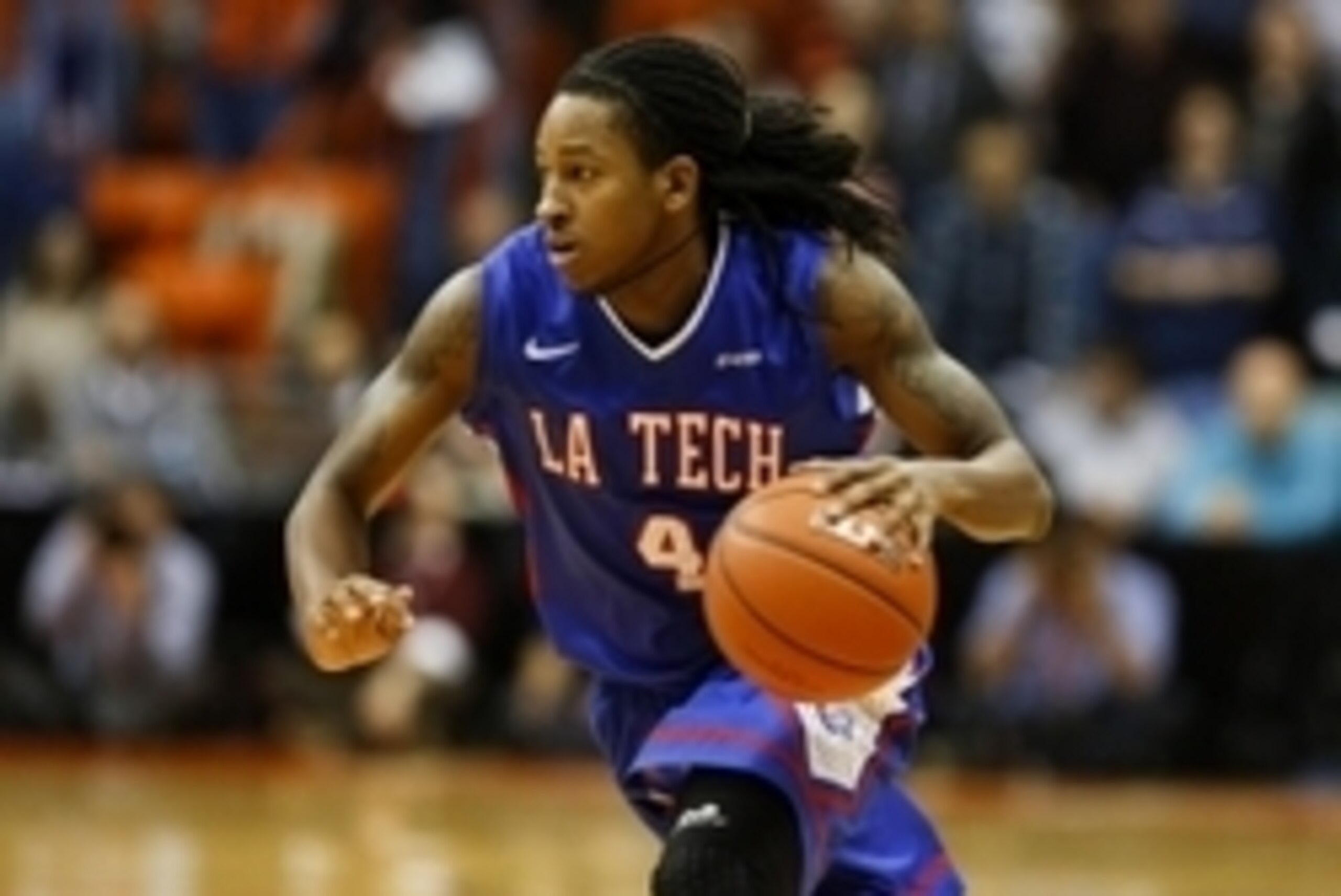Jan 8, 2015; El Paso, TX, USA; Louisiana Tech Bulldogs guard Kenneth Smith (4) dribbles the ball against the UTEP Miners at the Don Haskins Center. The Bulldogs defeated the Miners 58-45. Mandatory Credit: Ivan Pierre Aguirre-USA TODAY Sports