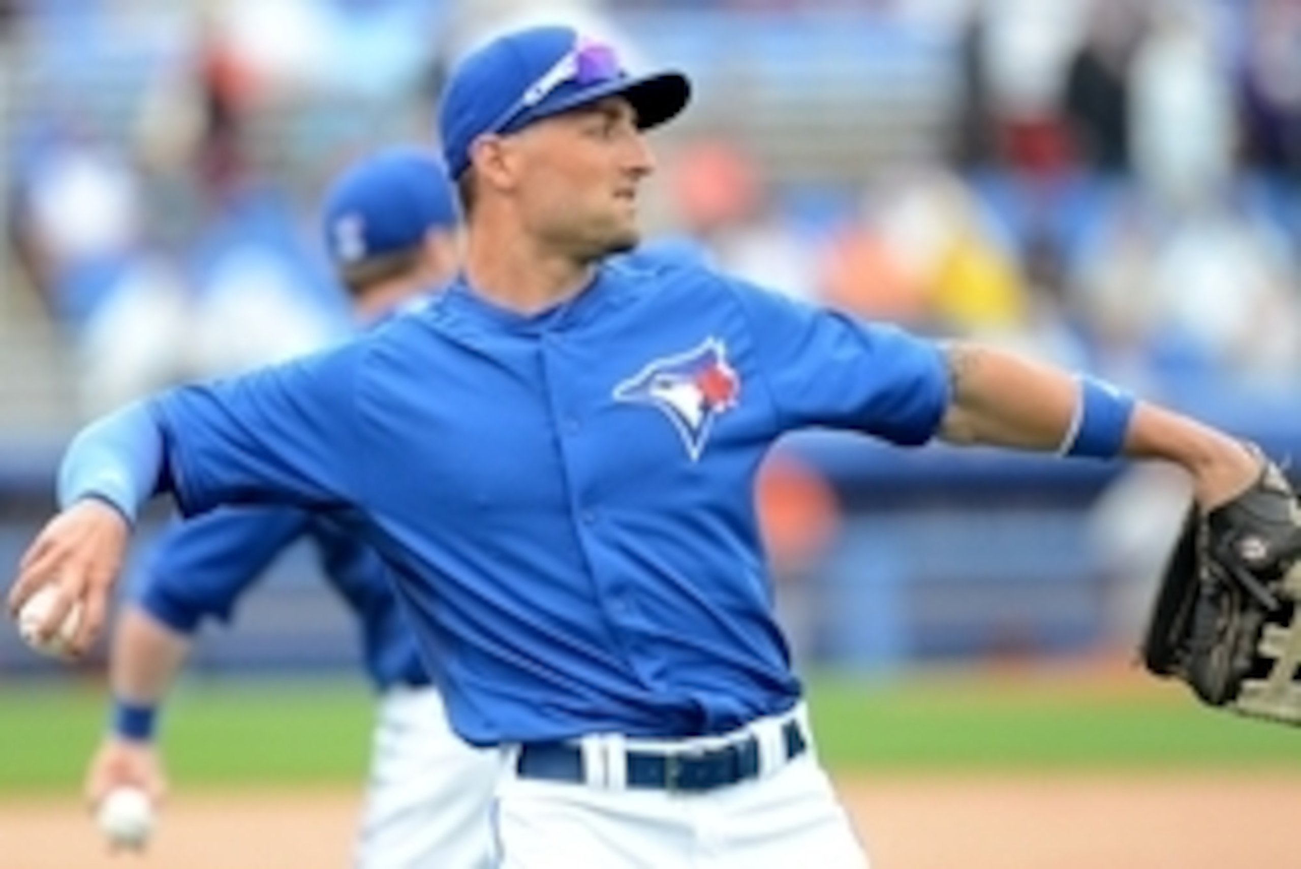 Mar 6, 2015; Dunedin, FL, USA;  Toronto Blue Jays  outfielder Kevin Pillar (11) warms up before the start of the spring training baseball game against the Baltimore Orioles  at Florida Auto Exchange Park. Mandatory Credit: Jonathan Dyer-USA TODAY Sports