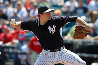 Mar 15, 2015; Tampa, FL, USA; New York Yankees starting pitcher Nathan Eovaldi (30) throws a pitch during the first inning against the Philadelphia Phillies at George M. Steinbrenner Field. Mandatory Credit: Kim Klement-USA TODAY Sports Mar 15, 2015; Tampa, FL, USA; New York Yankees starting pitcher Nathan Eovaldi (30) throws a pitch during the first inning against the Philadelphia Phillies at George M. Steinbrenner Field. Mandatory Credit: Kim Klement-USA TODAY Sports