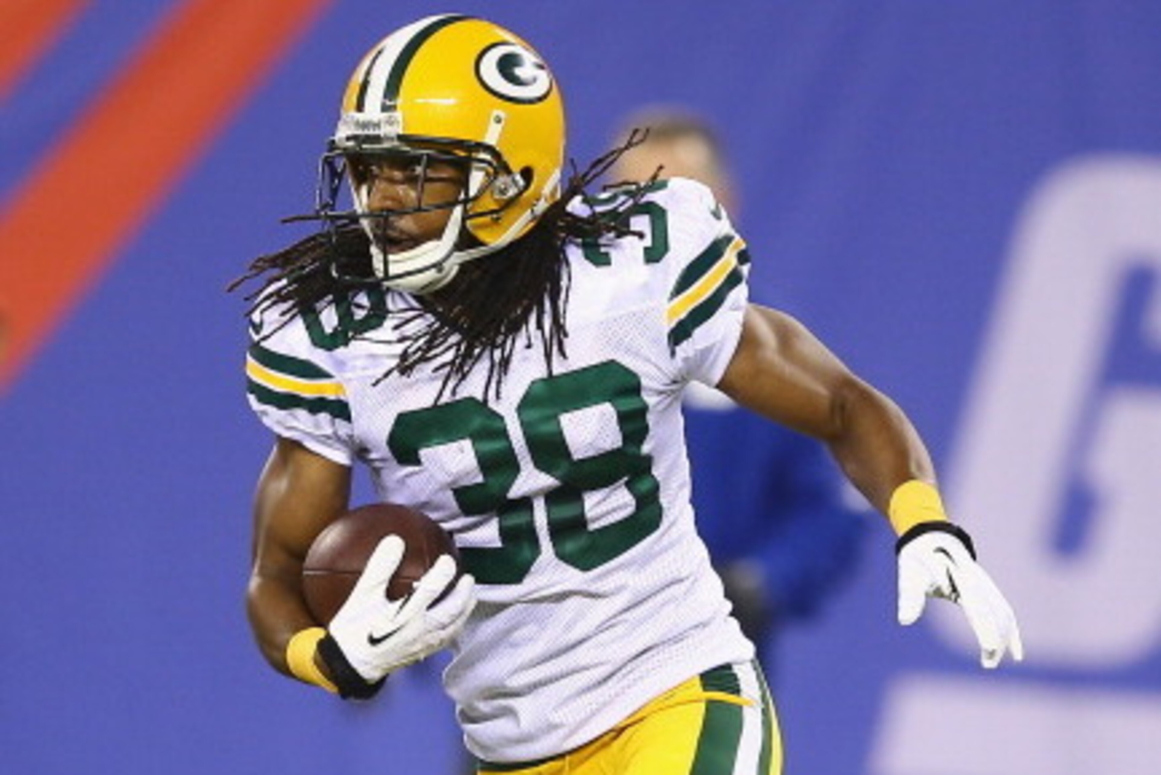 EAST RUTHERFORD, NJ - NOVEMBER 17: Tramon Williams #38 of the Green Bay Packers runs after making an interception against the New York Giants during their game at MetLife Stadium on November 17, 2013 in East Rutherford, New Jersey. (Photo by Al Bello/G EAST RUTHERFORD, NJ - NOVEMBER 17: Tramon Williams #38 of the Green Bay Packers runs after making an interception against the New York Giants during their game at MetLife Stadium on November 17, 2013 in East Rutherford, New Jersey. (Photo by Al Bello/G