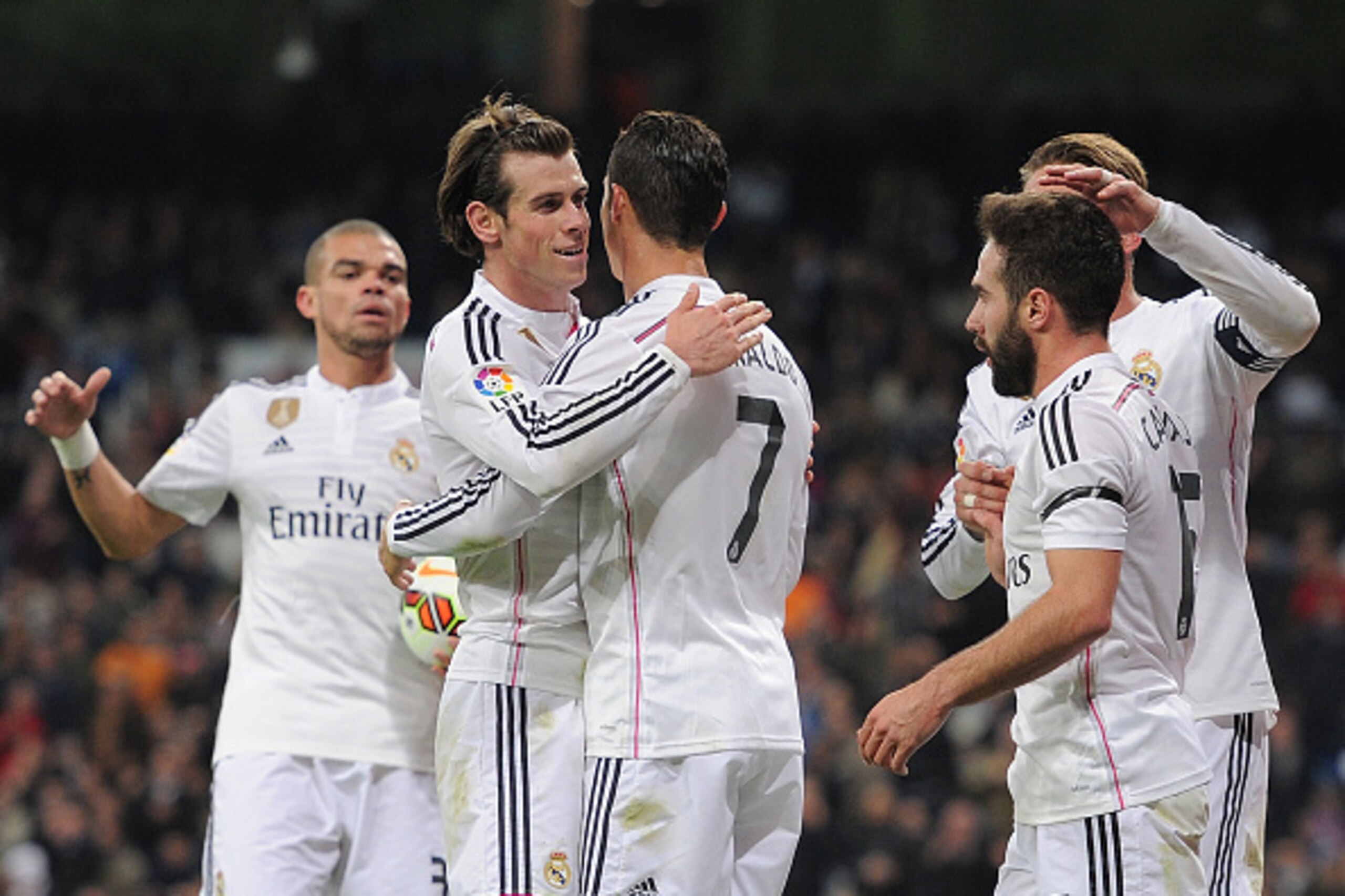 MADRID, SPAIN - MARCH 15:  Gareth Bale of Real Madrid celebrates with Cristiano Ronaldo after scoring Real's 2nd goal during the La Liga match between Real Madrid CF and Levante UD at Estadio Santiago Bernabeu on March 15, 2015 in Madrid, Spain.  (Photo b