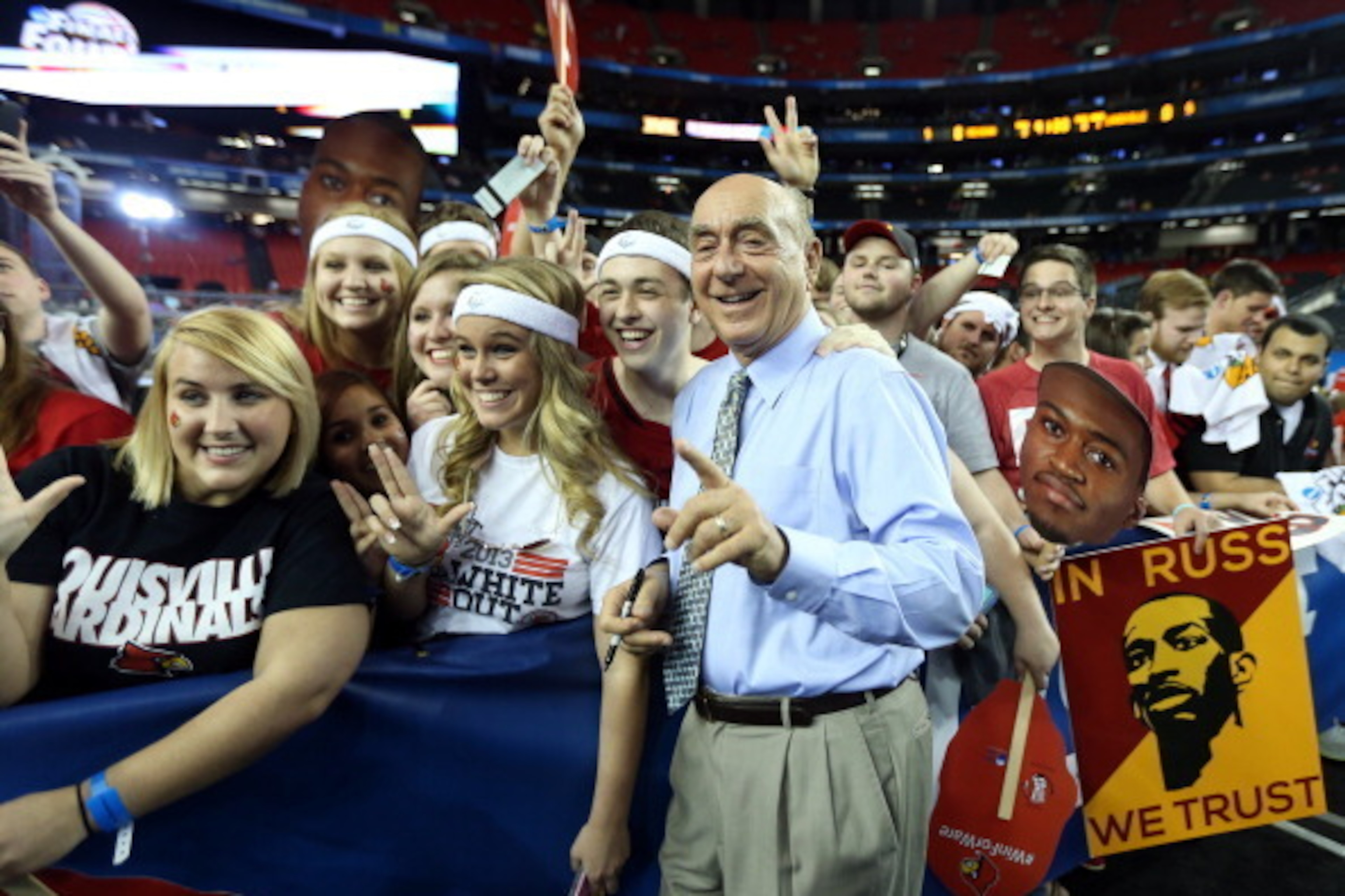 ATLANTA, GA - APRIL 08: ESPN broadcaster Dick Vitale poses with fans before the 2013 NCAA Men's Final Four Championship between the Michigan Wolverines and the Louisville Cardinals at the Georgia Dome on April 8, 2013 in Atlanta, Georgia. (Photo by Andy ATLANTA, GA - APRIL 08: ESPN broadcaster Dick Vitale poses with fans before the 2013 NCAA Men's Final Four Championship between the Michigan Wolverines and the Louisville Cardinals at the Georgia Dome on April 8, 2013 in Atlanta, Georgia. (Photo by Andy