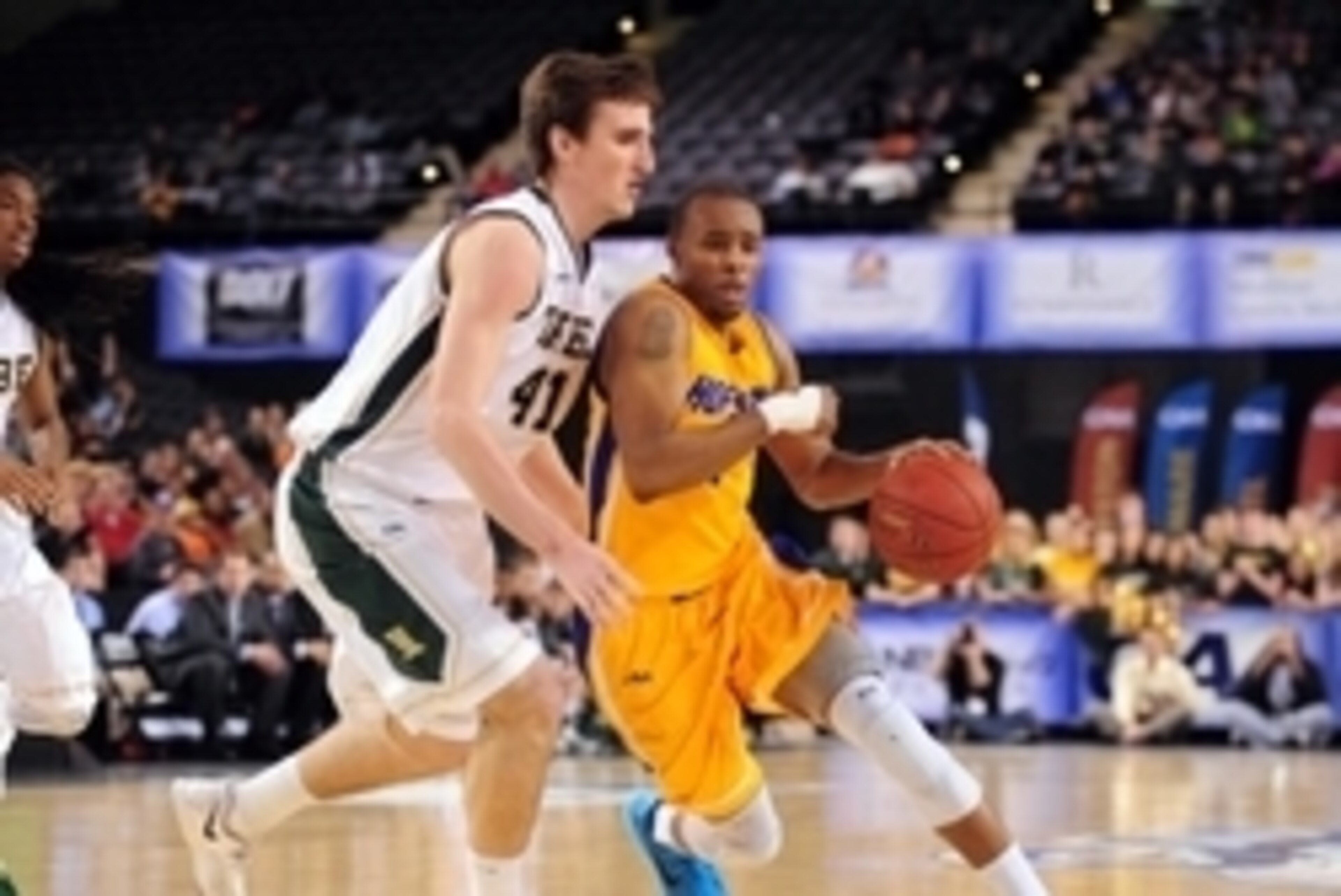 Mar 8, 2015; Baltimore, MD, USA; Hofstra Pride guard Juan'ya Green (1) is defended by William & Mary Tribe forward Jack Whitman (41) during the second half of the semifinals of the Colonial Conference Tournament at Royal Farms Arena. Mandatory Credit: Eva