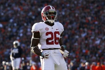 AUBURN, AL - NOVEMBER 30:  Landon Collins #26 of the Alabama Crimson Tide celebrates a defensice stop against the Auburn Tigers at Jordan-Hare Stadium on November 30, 2013 in Auburn, Alabama.  (Photo by Kevin C. Cox/Getty Images)