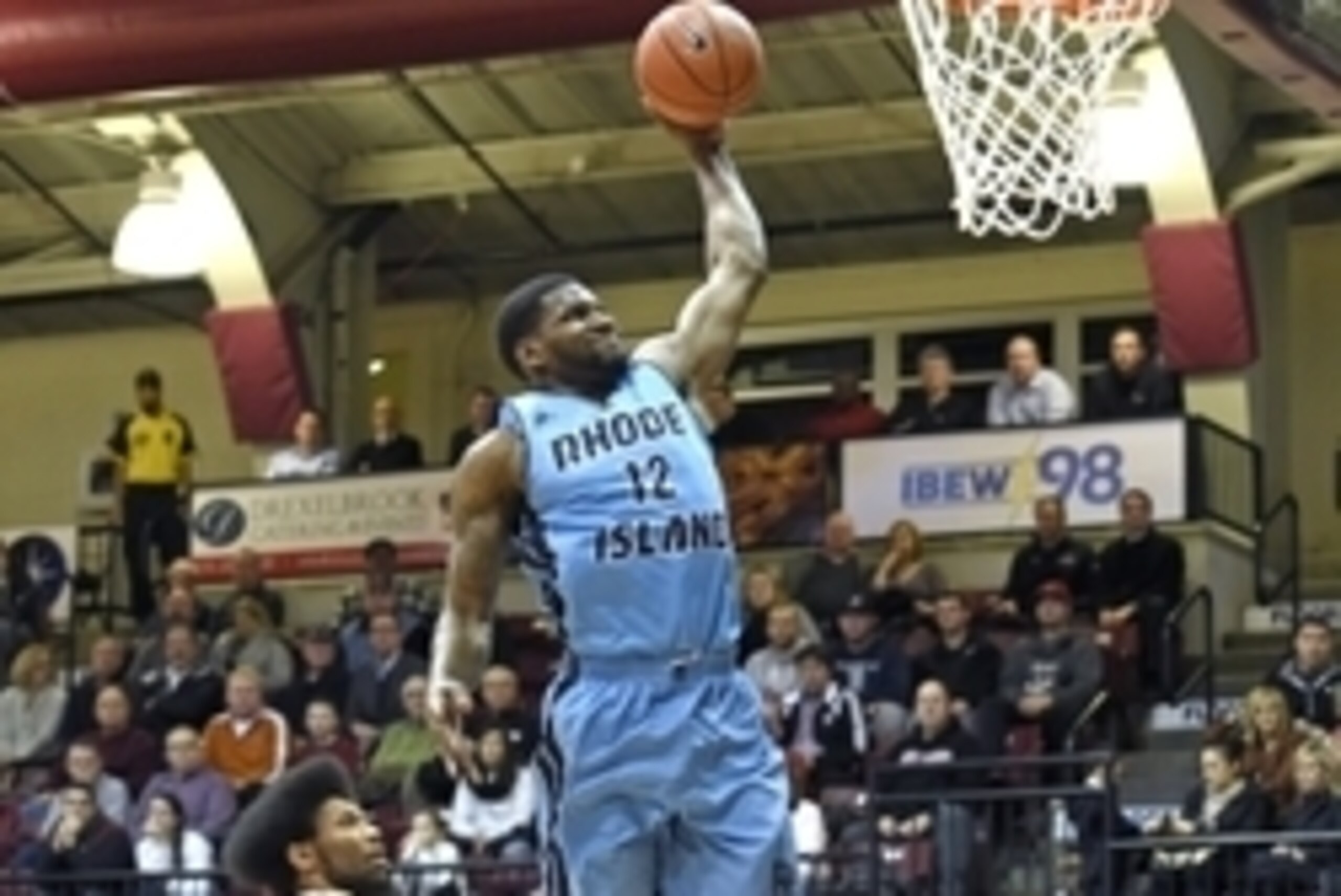 Feb 11, 2015; Philadelphia, PA, USA; Rhode Island Rams forward Hassan Martin (12) slam dunks during the first half against the Saint Joseph's Hawks at Hagan Arena. Mandatory Credit: Eric Hartline-USA TODAY Sports