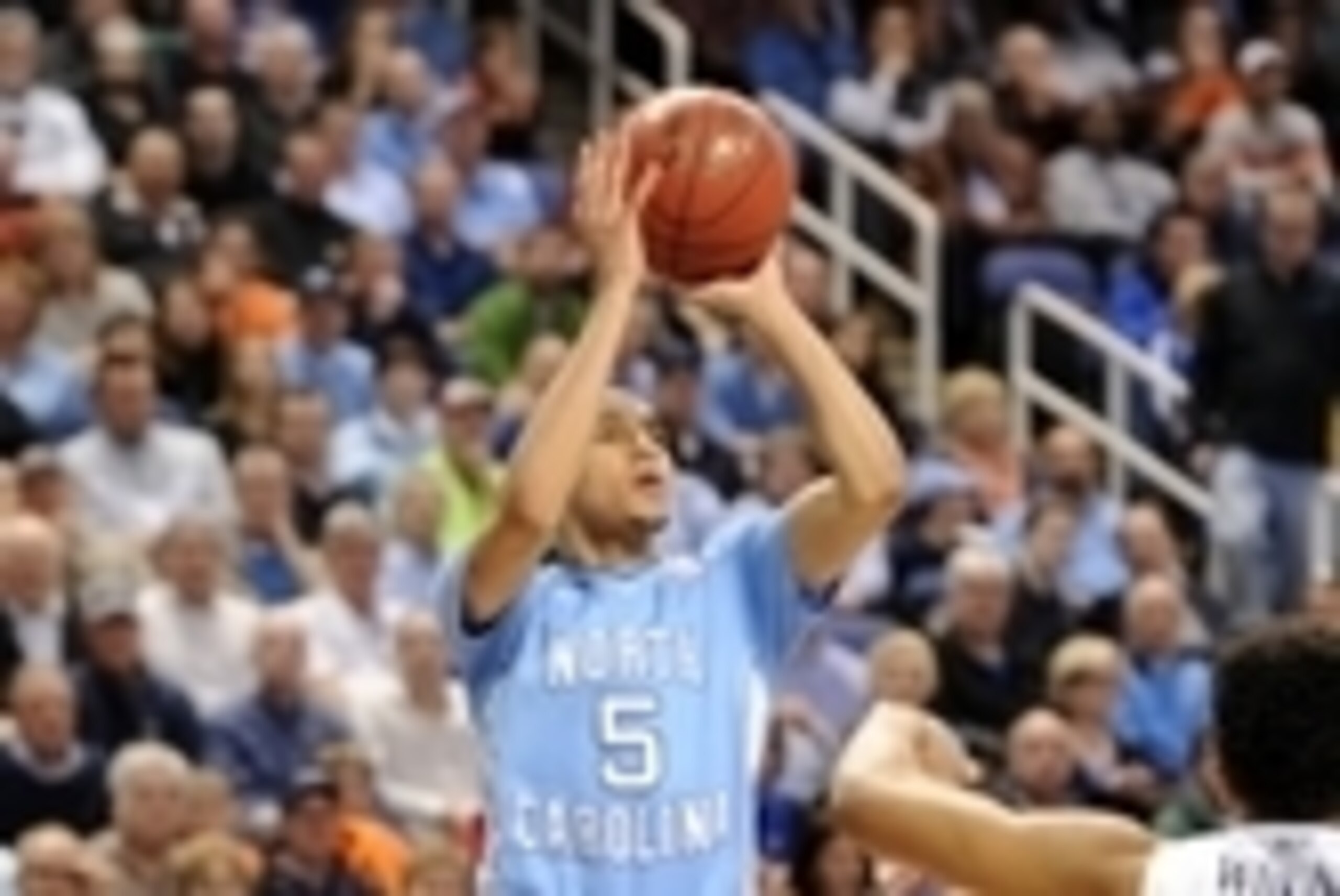 Mar 13, 2015; Greensboro, NC, USA; North Carolina Tar Heels guard Marcus Paige (5) shoots over Virginia Cavaliers forward Isaiah Wilkins (21) in the second half during the semifinals of the ACC Tournament at Greensboro Coliseum. The North Carolina Tar Hee Mar 13, 2015; Greensboro, NC, USA; North Carolina Tar Heels guard Marcus Paige (5) shoots over Virginia Cavaliers forward Isaiah Wilkins (21) in the second half during the semifinals of the ACC Tournament at Greensboro Coliseum. The North Carolina Tar Hee