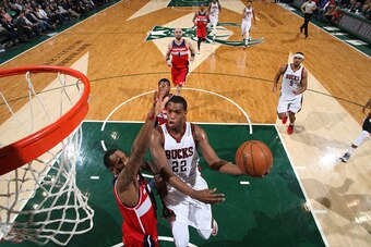 MILWAUKEE, WI - MARCH 7: Khris Middleton #22 of the Milwaukee Bucks goes for the layup against the Washington Wizards during the game on March 7, 2015 at BMO Harris Bradley Center in Milwaukee, Wisconsin. NOTE TO USER: User expressly acknowledges and agre