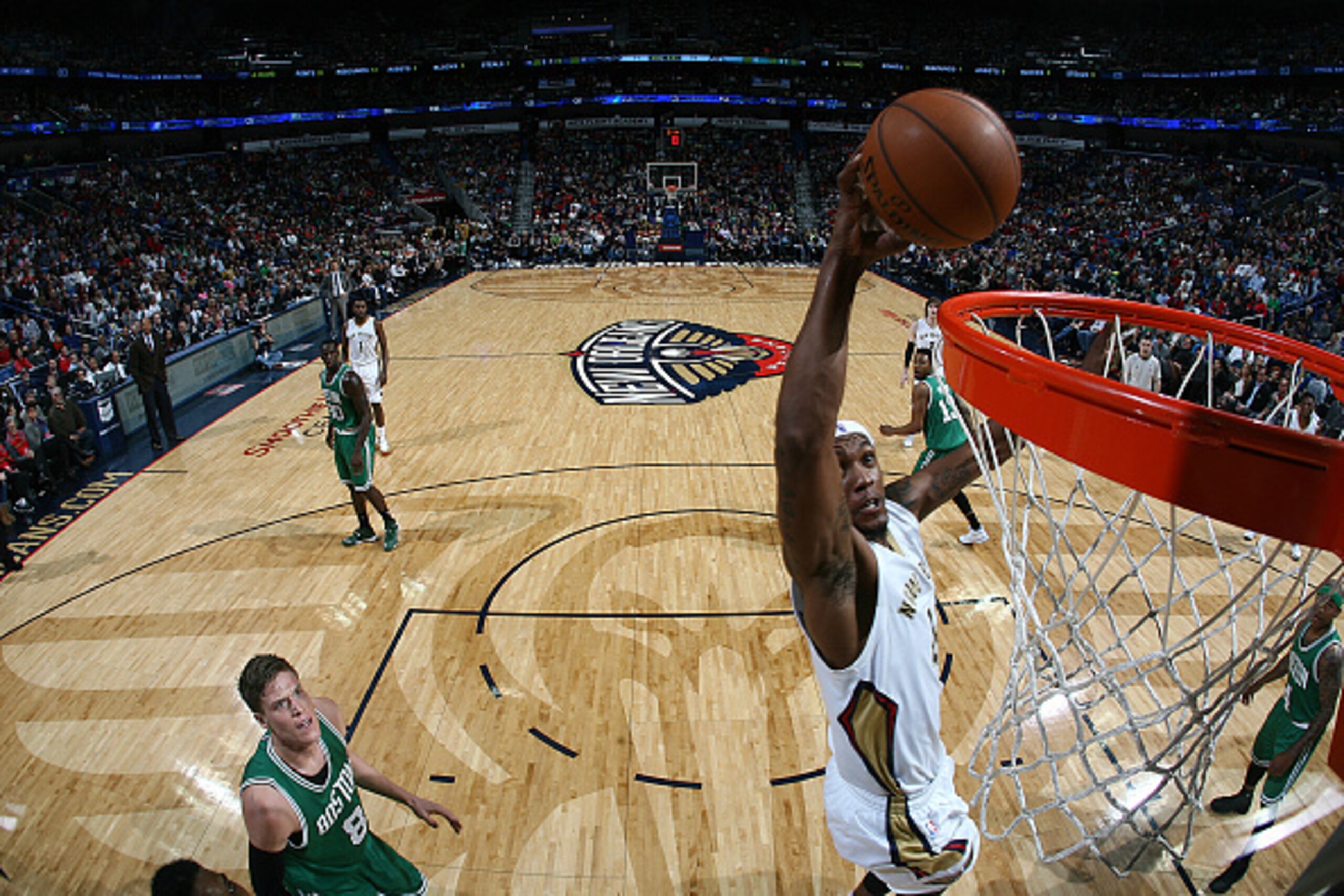 NEW ORLEANS, LA - MARCH 6: Dante Cunningham #44 of the New Orleans Pelicans goes up for a dunk against the Boston Celtics on March 6, 2015 at the Smoothie King Center in New Orleans, Louisiana. NOTE TO USER: User expressly acknowledges and agrees that, b NEW ORLEANS, LA - MARCH 6: Dante Cunningham #44 of the New Orleans Pelicans goes up for a dunk against the Boston Celtics on March 6, 2015 at the Smoothie King Center in New Orleans, Louisiana. NOTE TO USER: User expressly acknowledges and agrees that, b