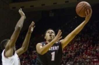 Nov 24, 2014; Bloomington, IN, USA;  Eastern Washington Eagles guard Tyler Harvey (1) shoots the ball over Indiana Hoosiers forward Troy Williams (5) in the second half of the game at Assembly Hall. Eastern Washington Eagles beats Indiana Hoosiers by the 