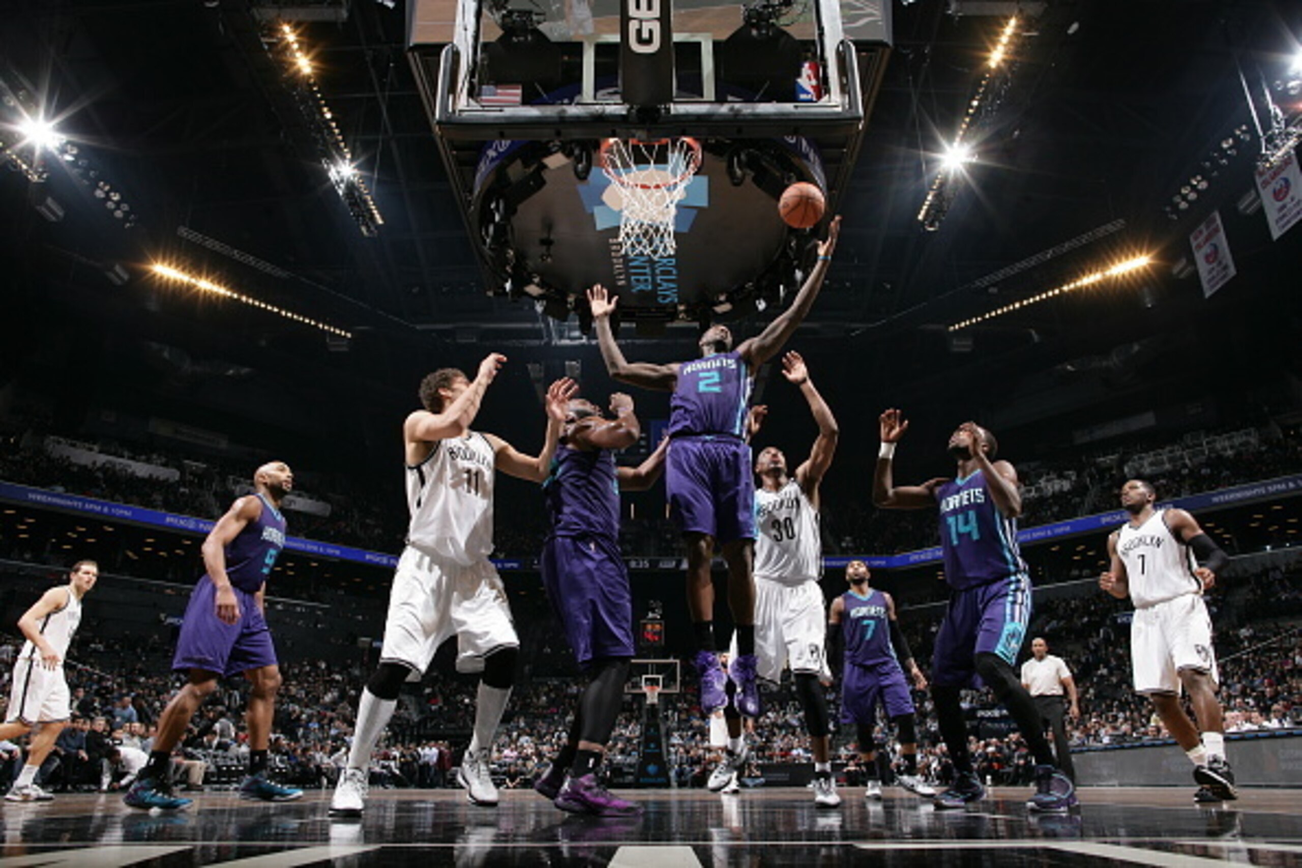 NEW YORK, NY - MARCH 4:  Marvin Williams #2 of the Charlotte Hornets grabs the rebound against the Brooklyn Nets on March 4, 2015 at the Barclays Center in the Brooklyn borough of New York City. NOTE TO USER: User expressly acknowledges and agrees that, b