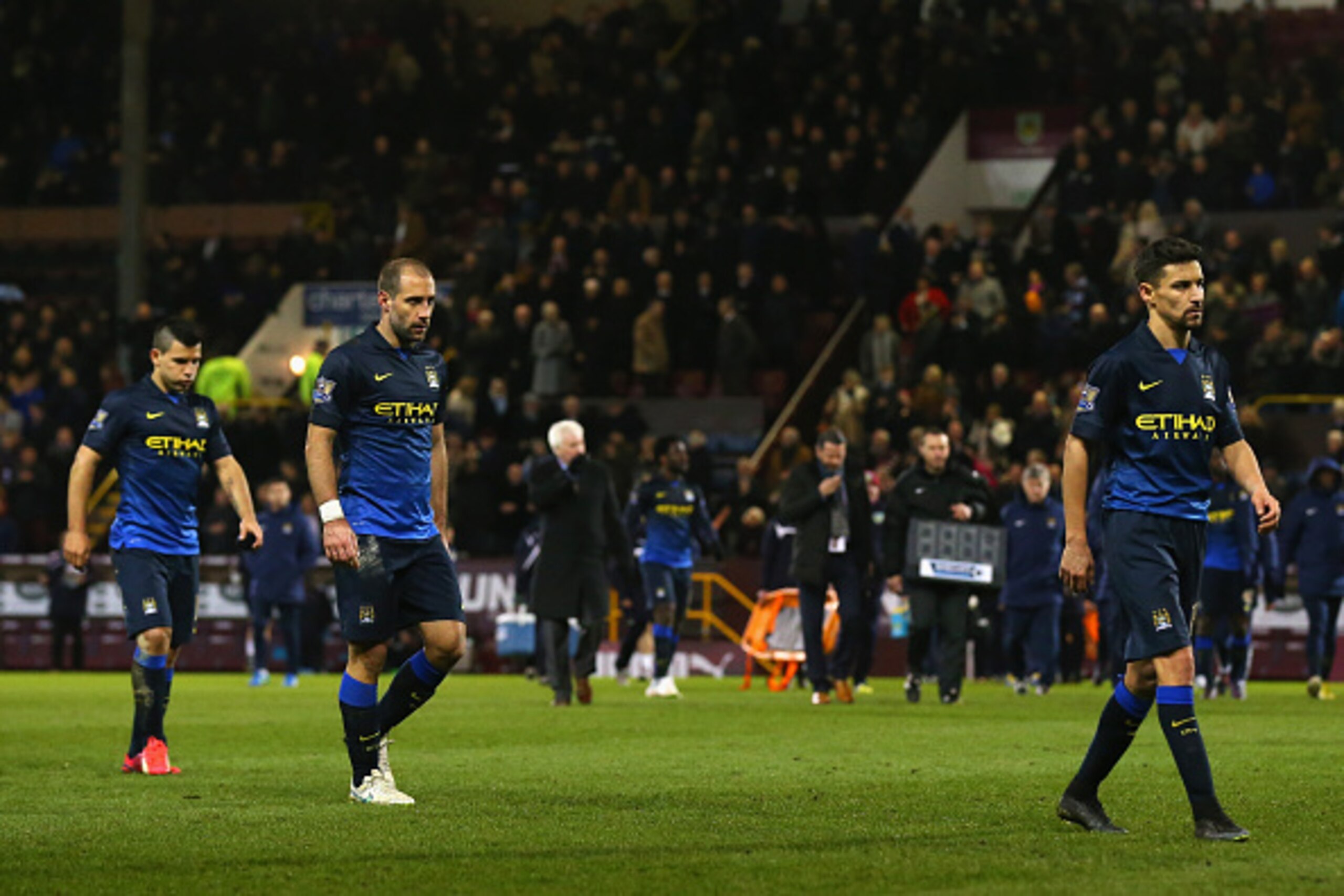 BURNLEY, ENGLAND - MARCH 14:  A dejected Pablo Zabaleta and Sergio Aguero of Manchester City after the Barclays Premier League match between Burnley and Manchester City at Turf Moor on March 14, 2015 in Burnley, England.  (Photo by Alex Livesey/Getty Imag