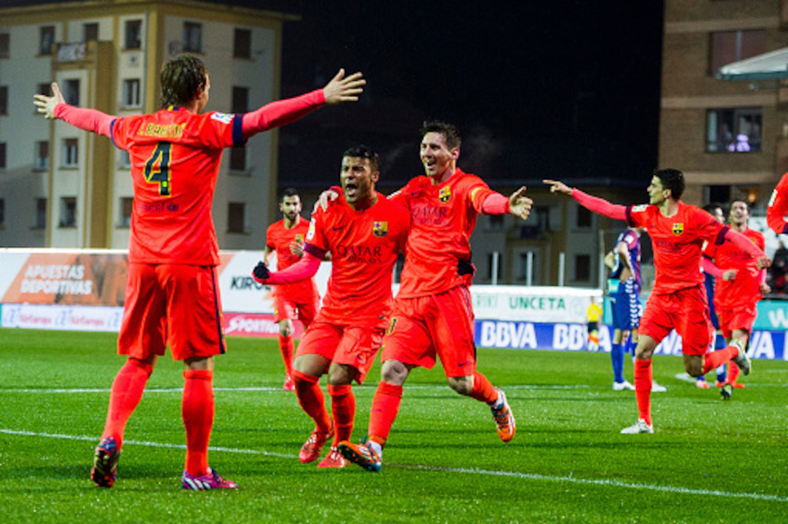 EIBAR, SPAIN - MARCH 14:  Lionel Messi of FC Barcelona celebrates with his teammate Rafinha of FC Barcelona after scoring his goal during the La Liga match between SD Eibar and FC Barcelona at Ipurua Municipal Stadium on March 14, 2015 in Eibar, Spain.  (