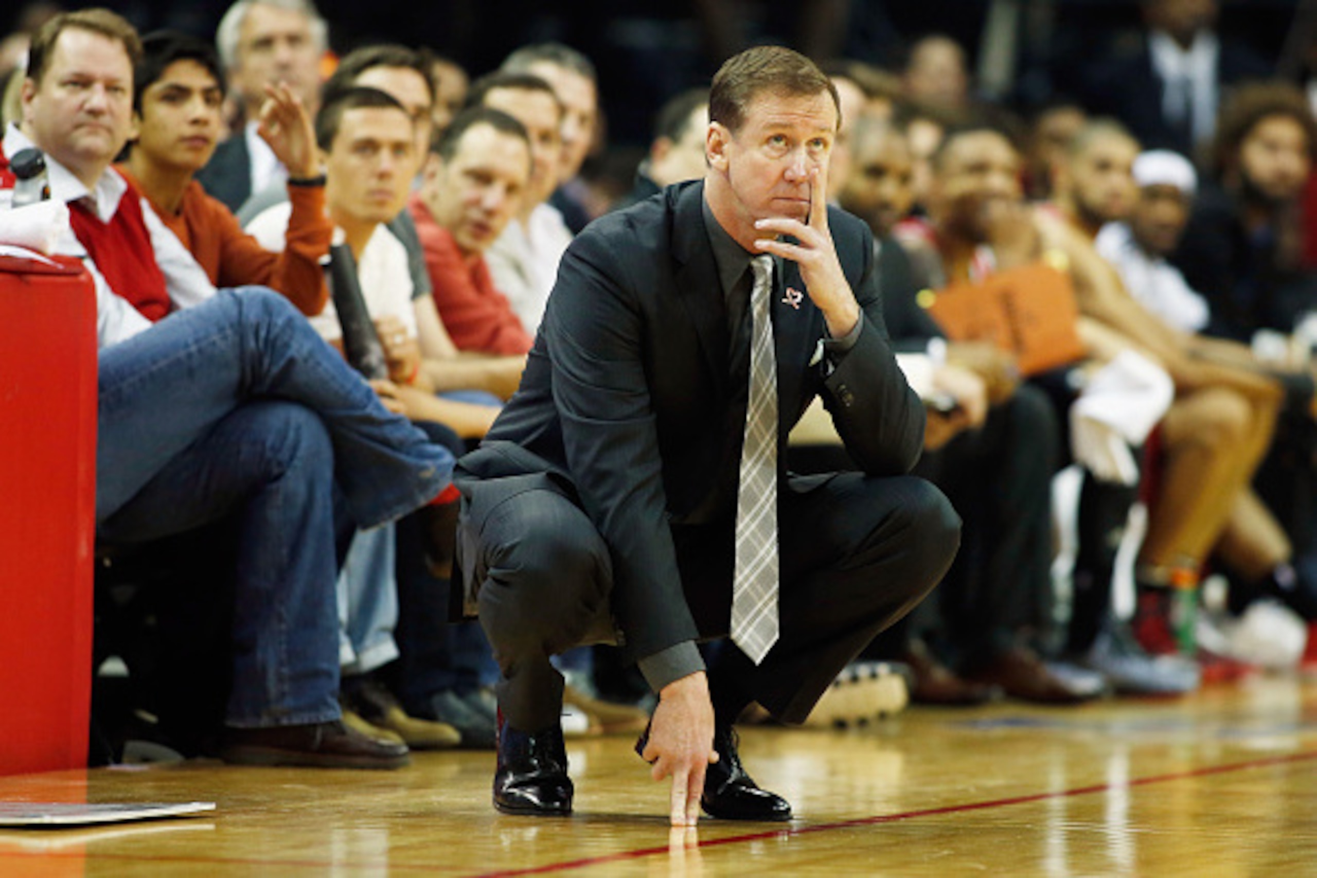 HOUSTON, TX - DECEMBER 22:  Head coach Terry Stotts of the Portland Trail Blazers watches the action during their game against the Houston Rockets at the Toyota Center on December 22, 2014 in Houston, Texas. NOTE TO USER: User expressly acknowledges and a