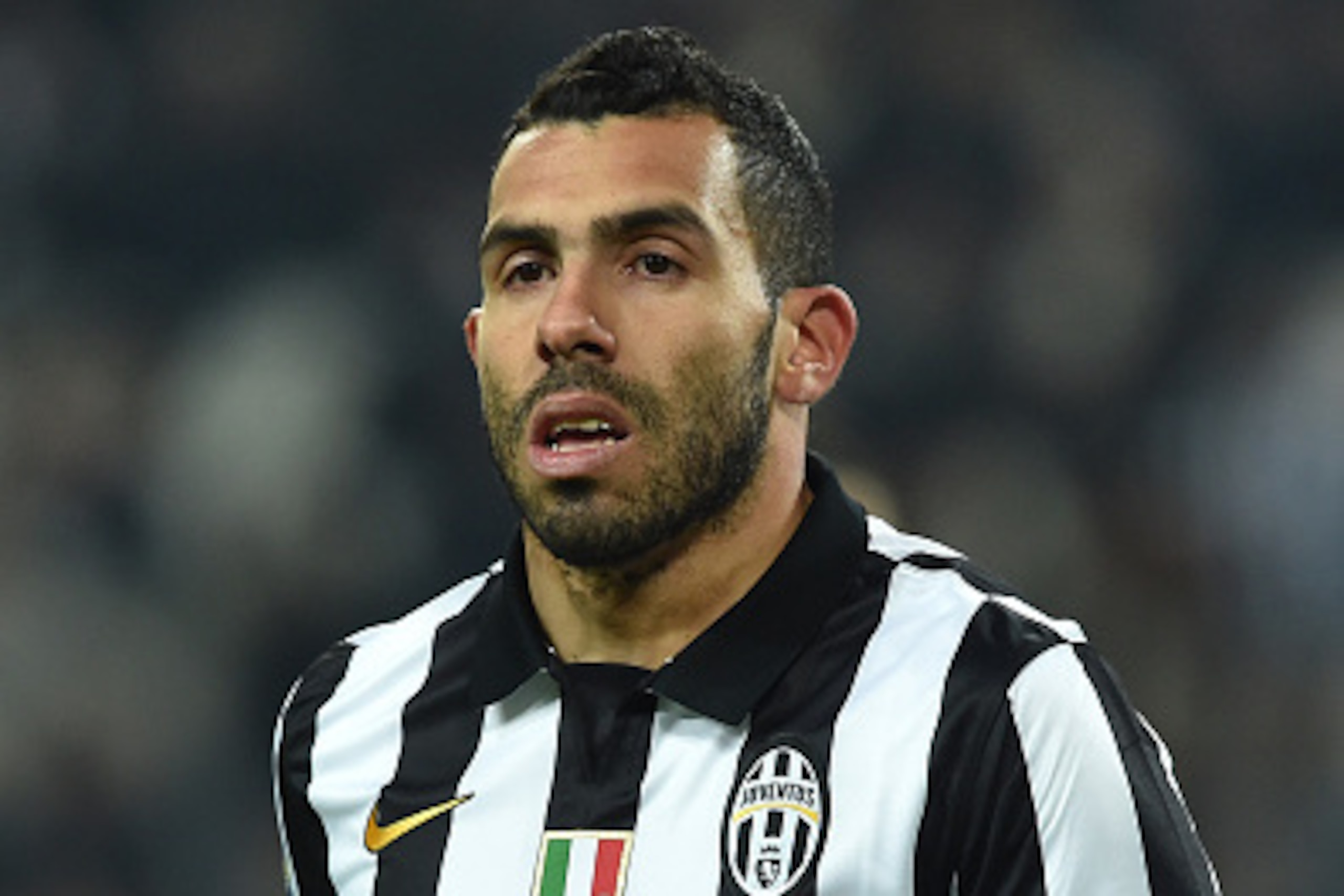 TURIN, ITALY - MARCH 09: Carlos Tevez of Juventus FC looks on during the Serie A match between Juventus FC and US Sassuolo Calcio at Juventus Arena on March 9, 2015 in Turin, Italy. (Photo by Valerio Pennicino/Getty Images) TURIN, ITALY - MARCH 09: Carlos Tevez of Juventus FC looks on during the Serie A match between Juventus FC and US Sassuolo Calcio at Juventus Arena on March 9, 2015 in Turin, Italy. (Photo by Valerio Pennicino/Getty Images)