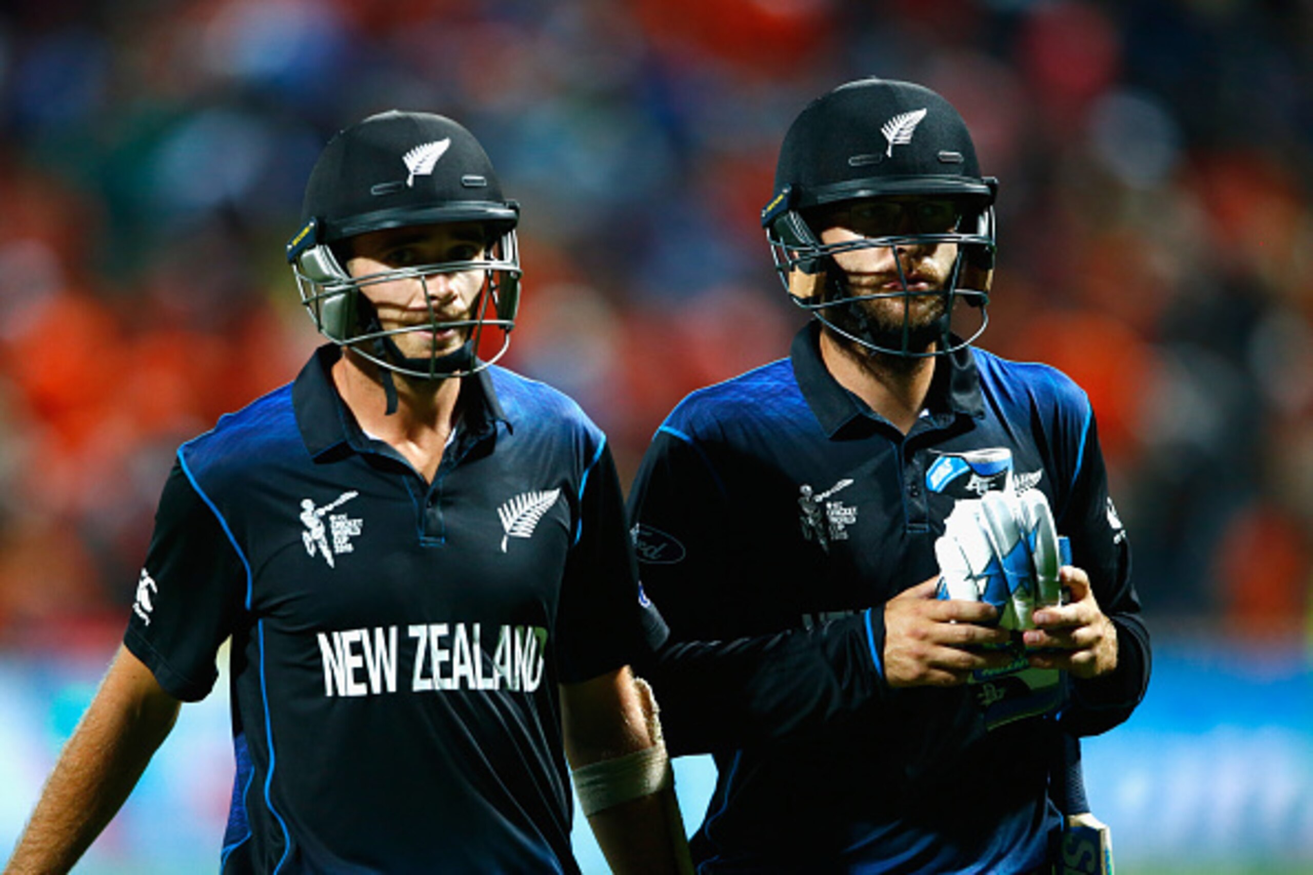 HAMILTON, NEW ZEALAND - MARCH 13:  Tim Southee (L) and Daniel Vettori of New Zealand (R) leave the field after winning the match during the 2015 ICC Cricket World Cup match between Bangladesh and New Zealand at Seddon Park on March 13, 2015 in Hamilton, N