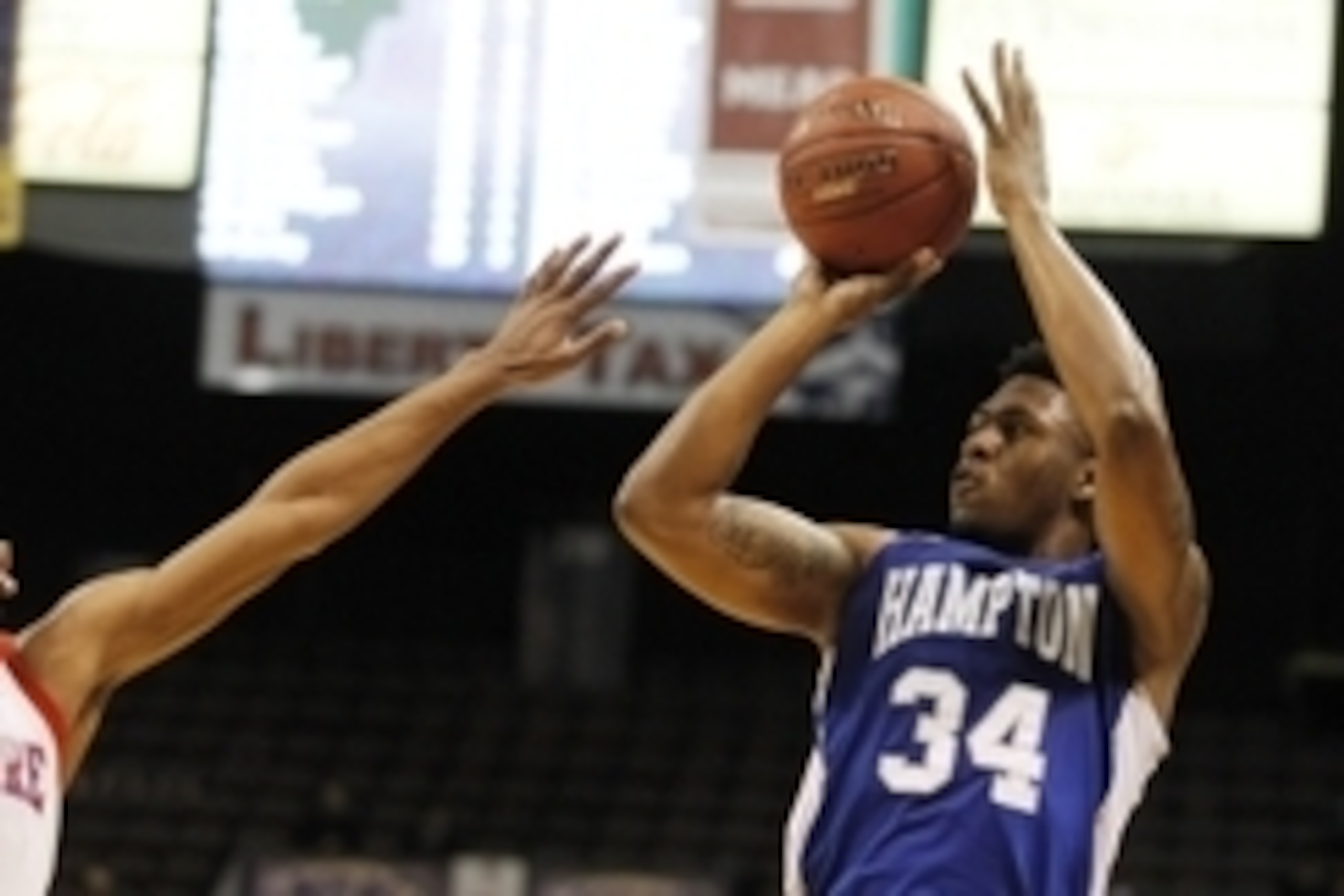 Mar 14, 2015; Norfolk, VA, USA; Hampton Pirates guard Reginald Johnson (34) shoots the ball during the first half against the Delaware State Hornets in the final of the MEAC Conference tournament at Norfolk Scope. Mandatory Credit: Peter Casey-USA TODAY S