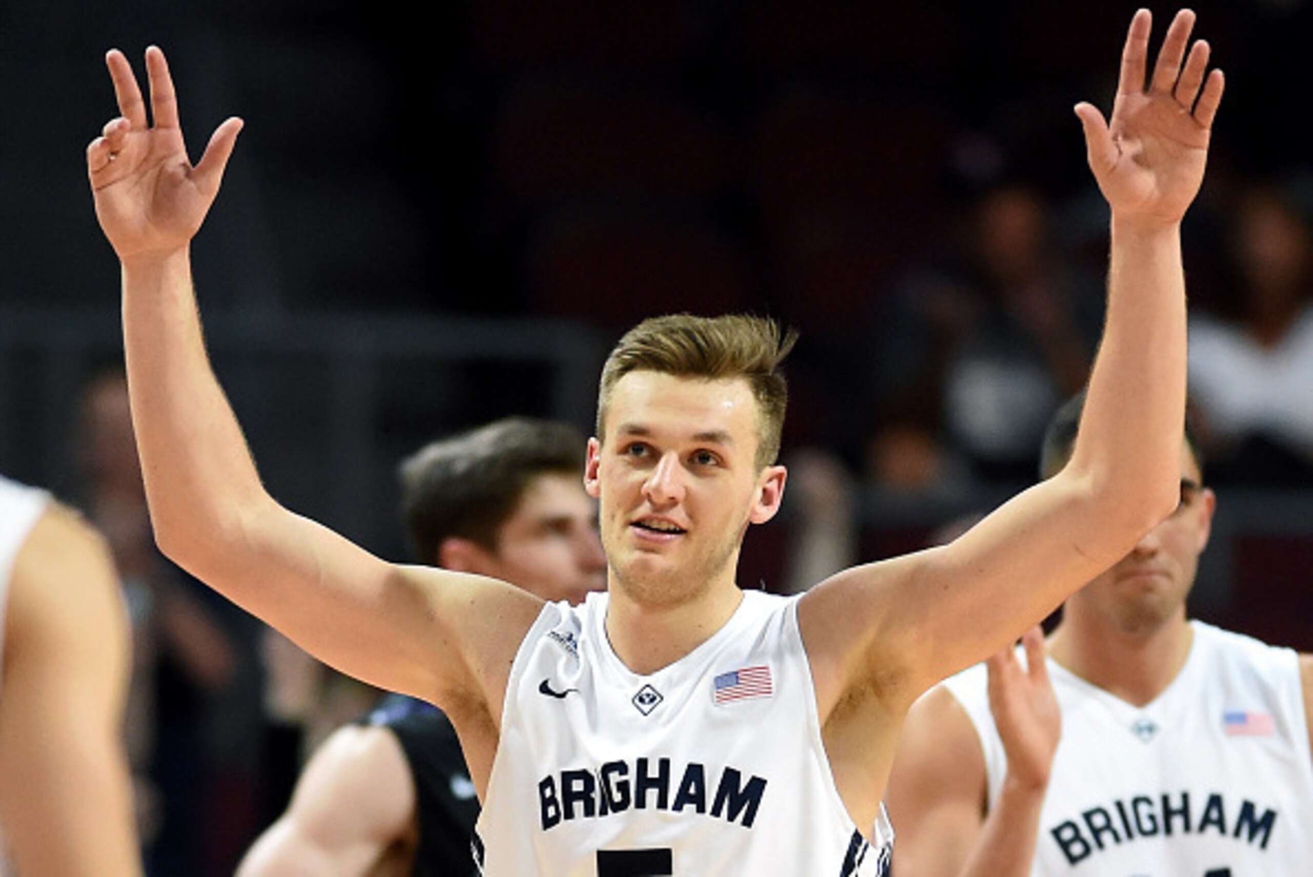 LAS VEGAS, NV - MARCH 09:  Kyle Collinsworth #5 of the Brigham Young Cougars reacts after tying the NCAA career record for triple-doubles with six, all coming this season, during a semifinal game of the West Coast Conference Basketball tournament at the O