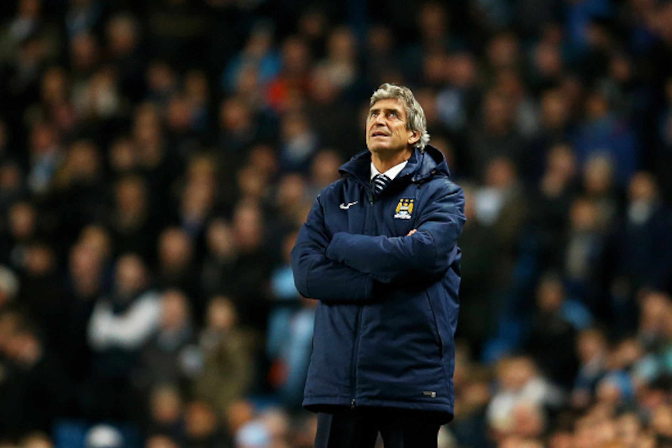 MANCHESTER, ENGLAND - MARCH 04:  Manuel Pellegrini the manager of Manchester City looks on during the Barclays Premier League match between Manchester City and Leicester City at the Etihad Stadium on March 4, 2015 in Manchester, England.  (Photo by Richar