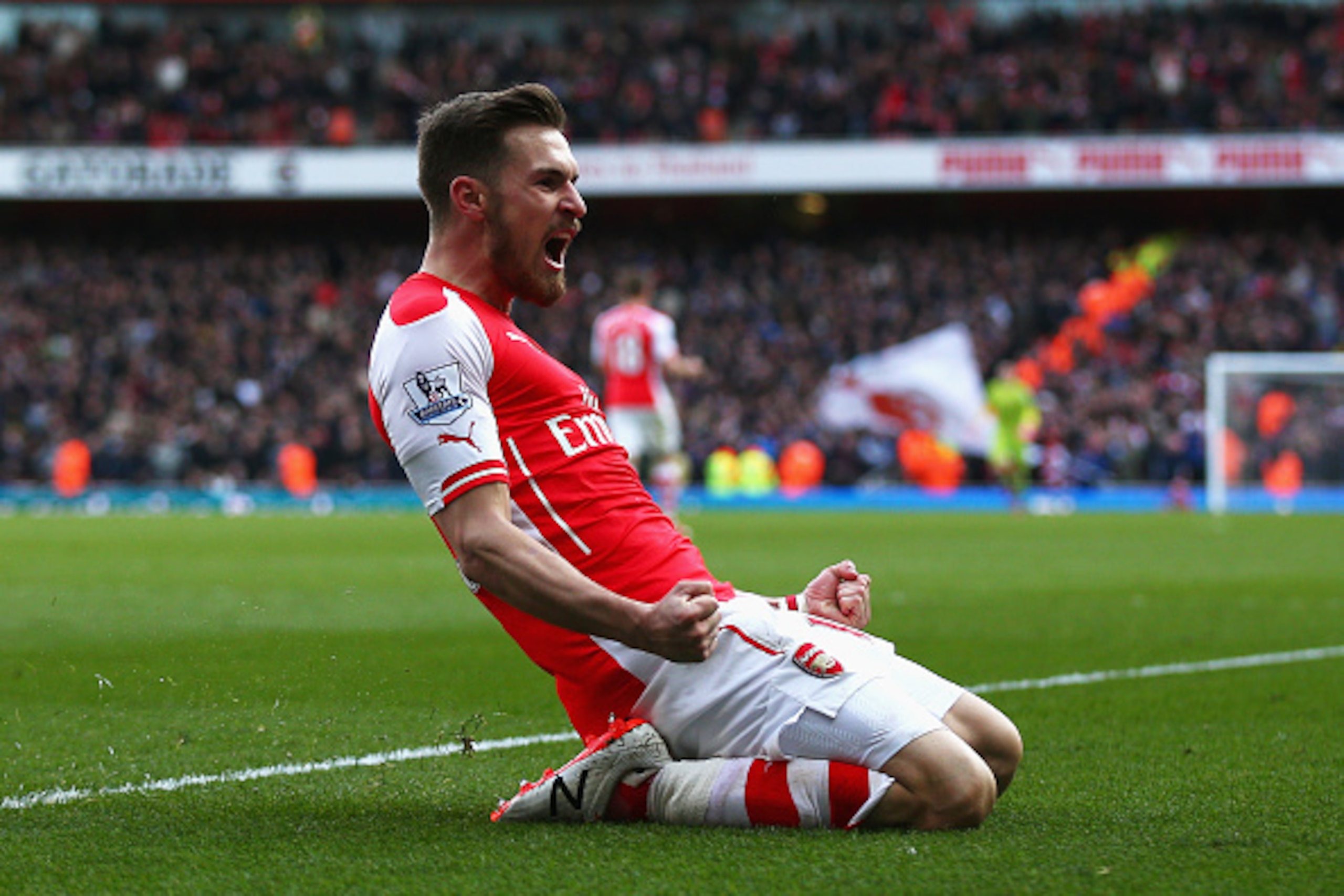 LONDON, ENGLAND - MARCH 14: Aaron Ramsey of Arsenal celebrates scoring his team's second goal during the Barclays Premier League match between Arsenal and West Ham United at Emirates Stadium on March 14, 2015 in London, England.  (Photo by Ian Walton/Gett