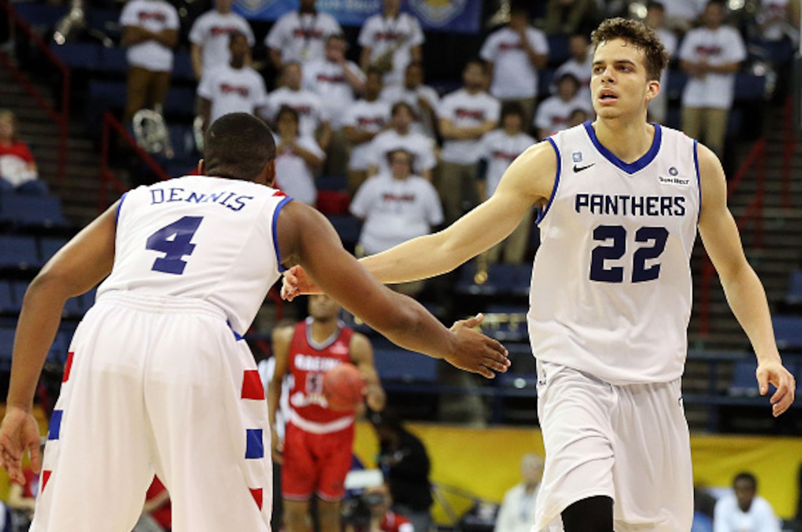 NEW ORLEANS, LA - MARCH 14: R.J. Hunter #22 of the Georgia State Panthers celebrates with Isaiah Dennis #4 of the Georgia State Panthers after scoring a layup against the Louisiana Lafayette Ragin Cajuns during the Sun Belt Conference Men's Championship S