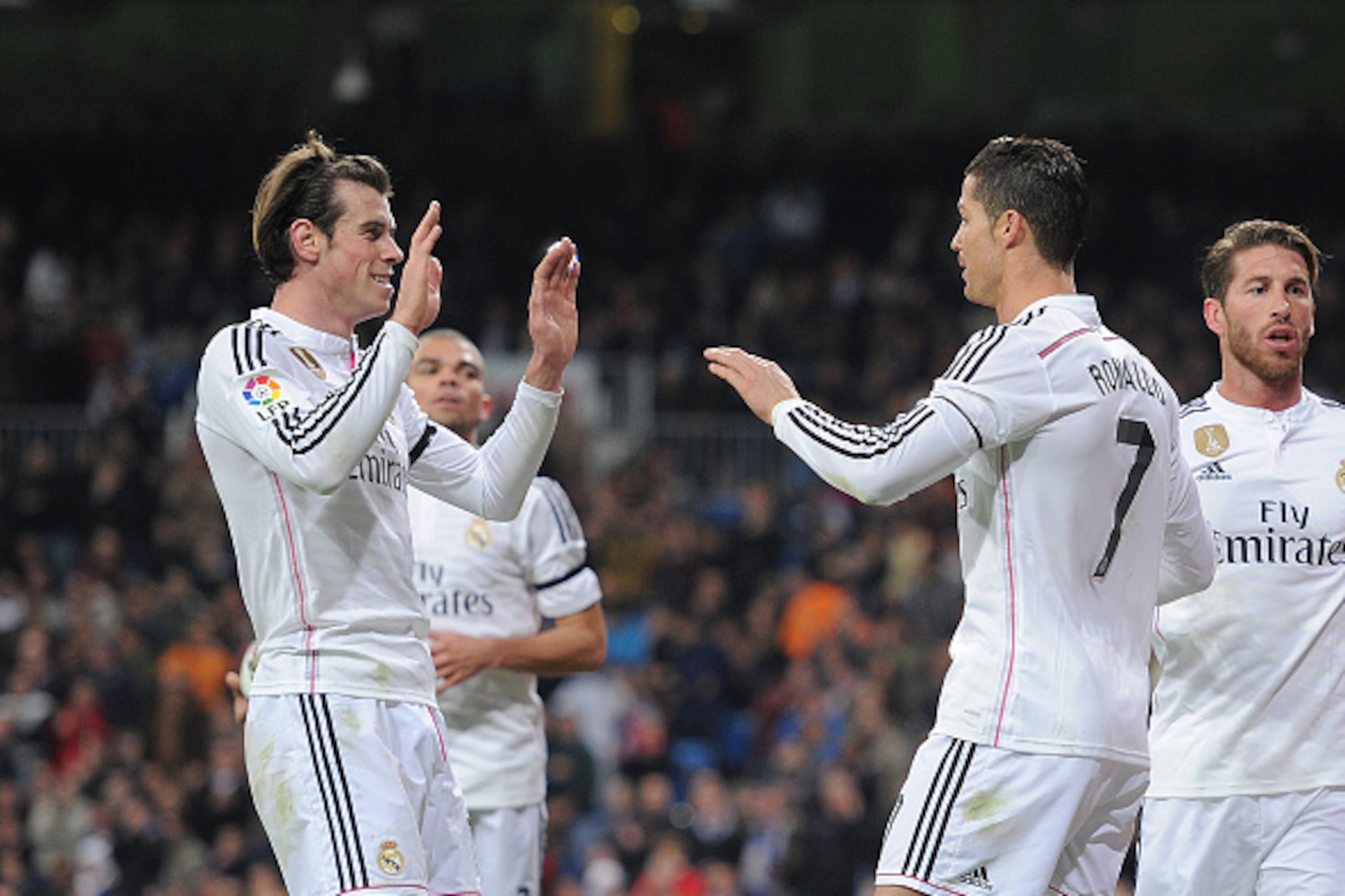 MADRID, SPAIN - MARCH 15:  Gareth Bale of Real Madrid celebrates with Cristiano Ronaldo after scoring Real's 2nd goal during the La Liga match between Real Madrid CF and Levante UD at Estadio Santiago Bernabeu on March 15, 2015 in Madrid, Spain.  (Photo b