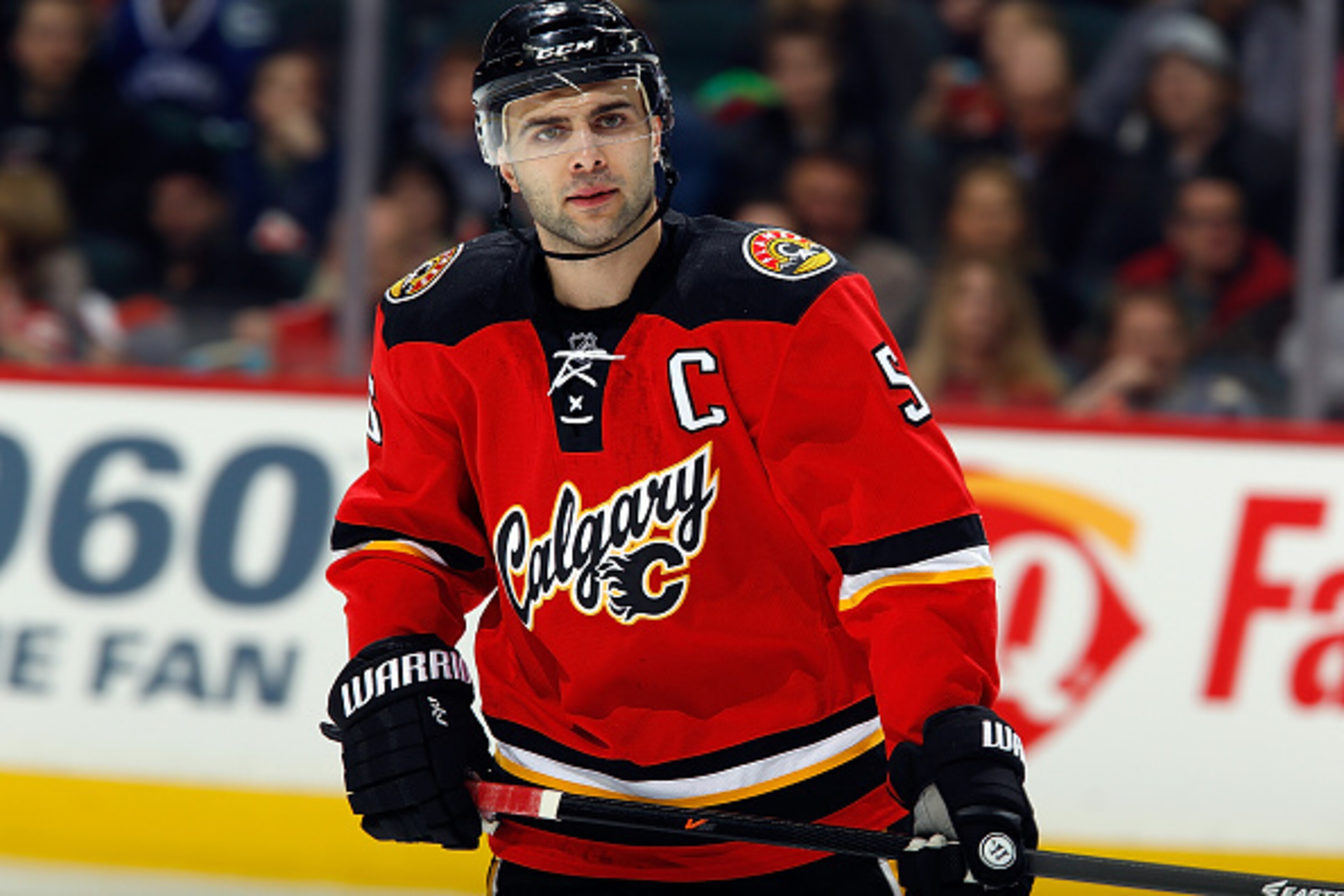 CALGARY, AB - FEBRUARY 14: Mark Giordano #5 of the Calgary Flames skates against the Vancouver Canucks at Scotiabank Saddledome on February 14, 2015 in Calgary, Alberta, Canada. The Flames won 3-2. (Photo by Gerry Thomas/NHLI via Getty Images)
