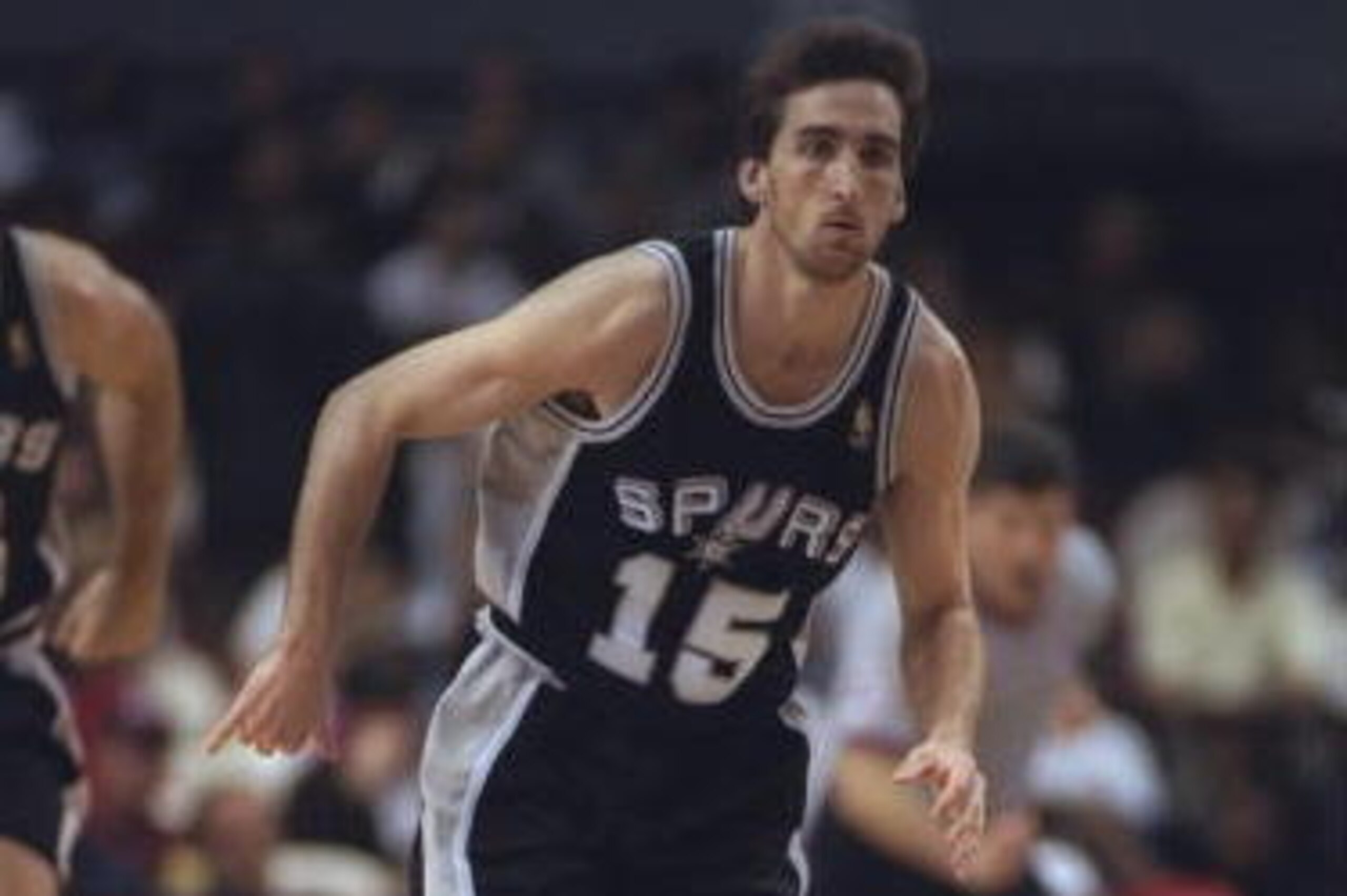 24 Mar 1997:  Guard Vinny Del Negro of the San Antonio Spurs moves the ball during a game against the Los Angeles Clippers at the Los Angeles Sports Arena in Los Angeles, California.  The Clippers won the game, 106-91. Mandatory Credit: Harry How  /Allspo
