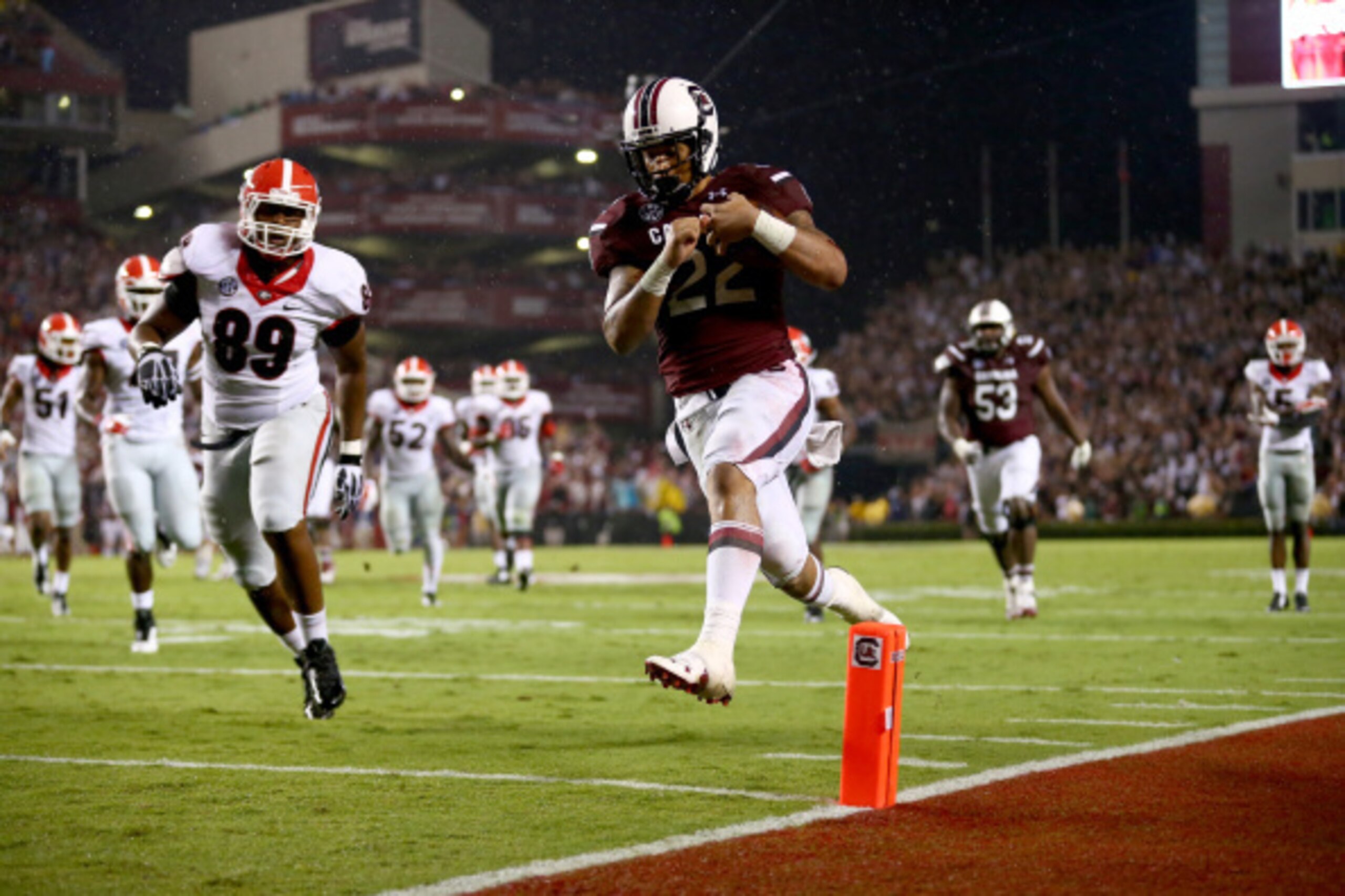 COLUMBIA, SC - SEPTEMBER 13:  James DeLoach #89 of the Georgia Bulldogs watches as Brandon Wilds #22 of the South Carolina Gamecocks runs for a touchdown during their game at Williams-Brice Stadium on September 13, 2014 in Columbia, South Carolina.  (Phot