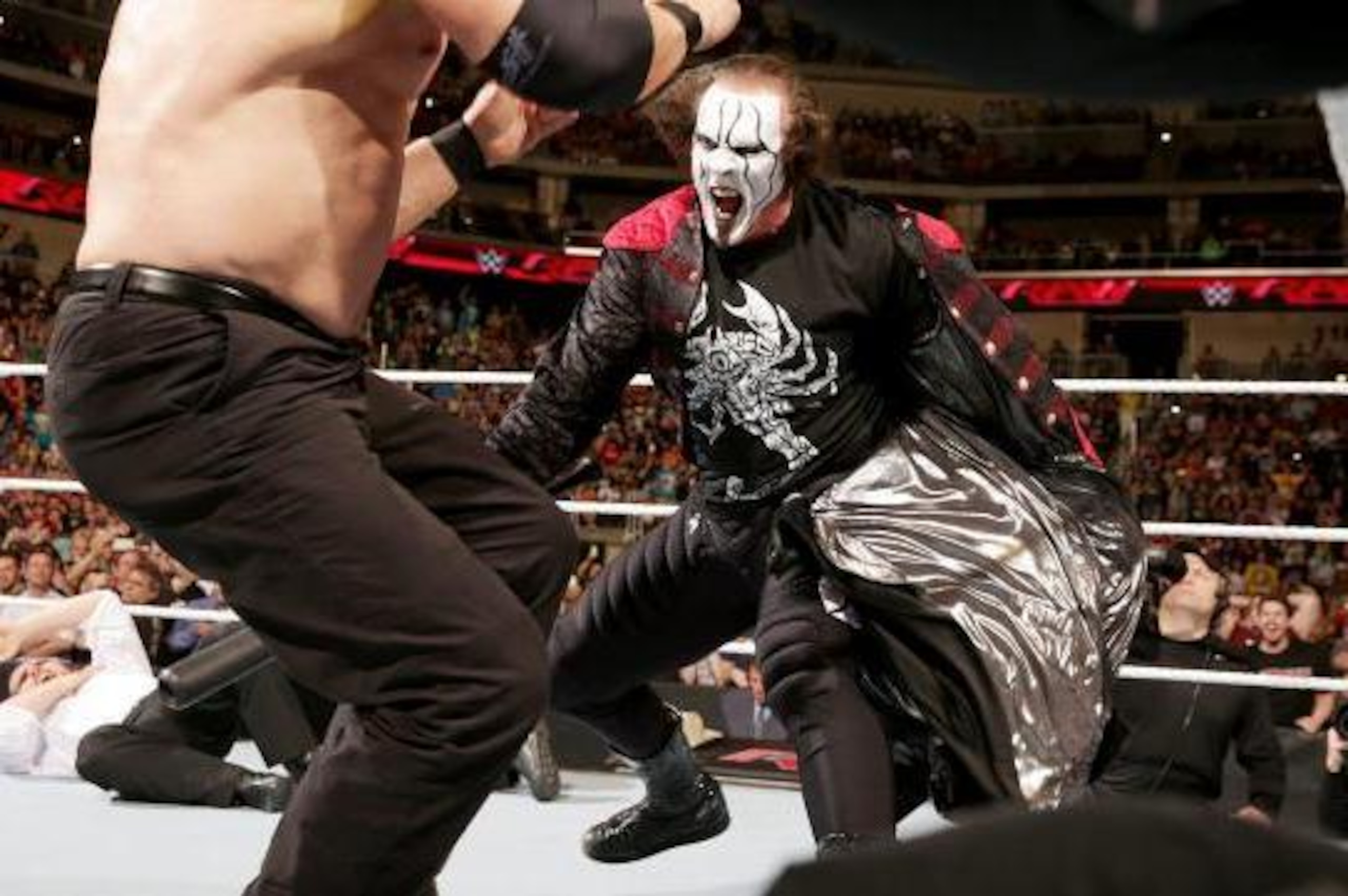 Sting attacks Kane.