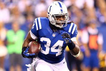 INDIANAPOLIS, IN - SEPTEMBER 15: Running back Trent Richardson #34 of the Indianapolis Colts carries the ball against the Philadelphia Eagles during a game at Lucas Oil Stadium on September 15, 2014 in Indianapolis, Indiana.  (Photo by Andy Lyons/Getty Im