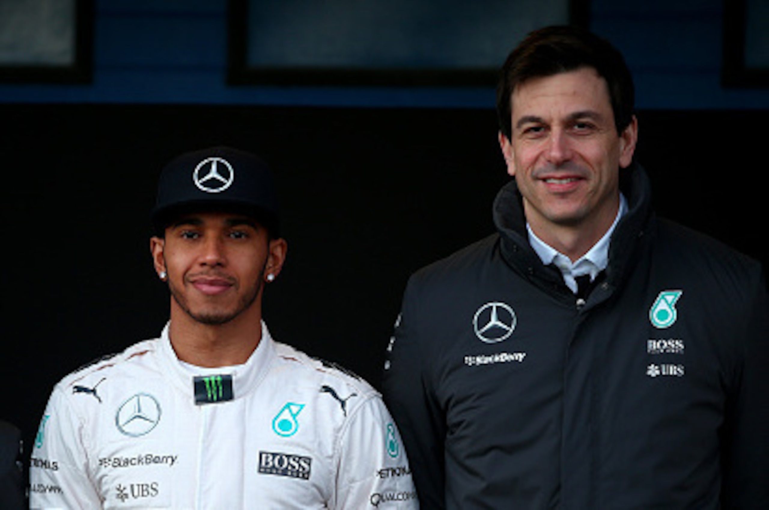 JEREZ DE LA FRONTERA, SPAIN - FEBRUARY 01:   Lewis Hamilton of Great Britain and Mercedes GP poses with Mercedes GP Executive Director Toto Wolff and Paddy Lowe, Mercedes Technical Executive Director at the launch of the new W06 outside the team garage du