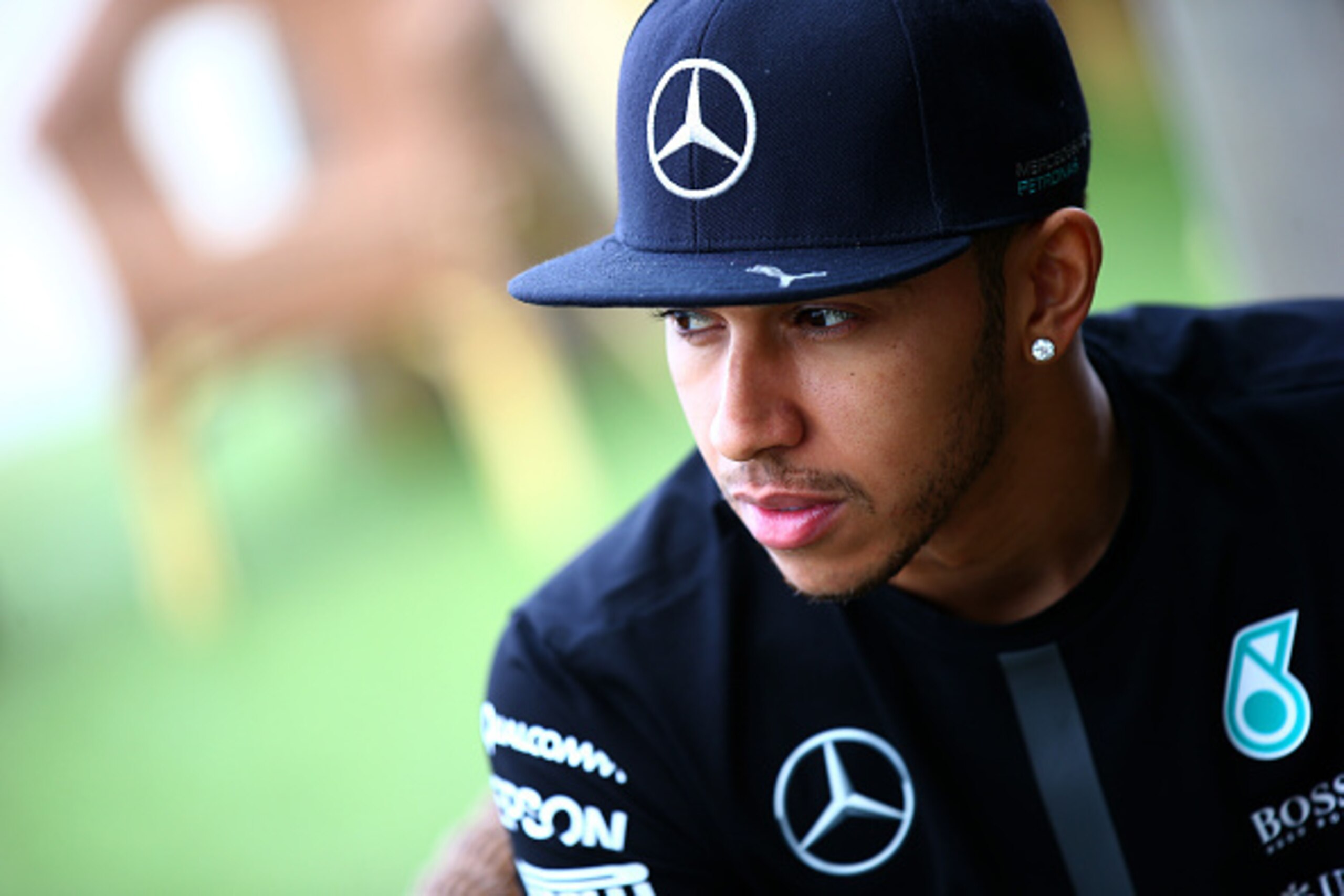 MELBOURNE, AUSTRALIA - MARCH 12:  Lewis Hamilton of Great Britain and Mercedes GP looks on as he speaks with members of the media next to St Kilda beach during previews to the Australian Formula One Grand Prix on March 12, 2015 in Melbourne, Australia.  (