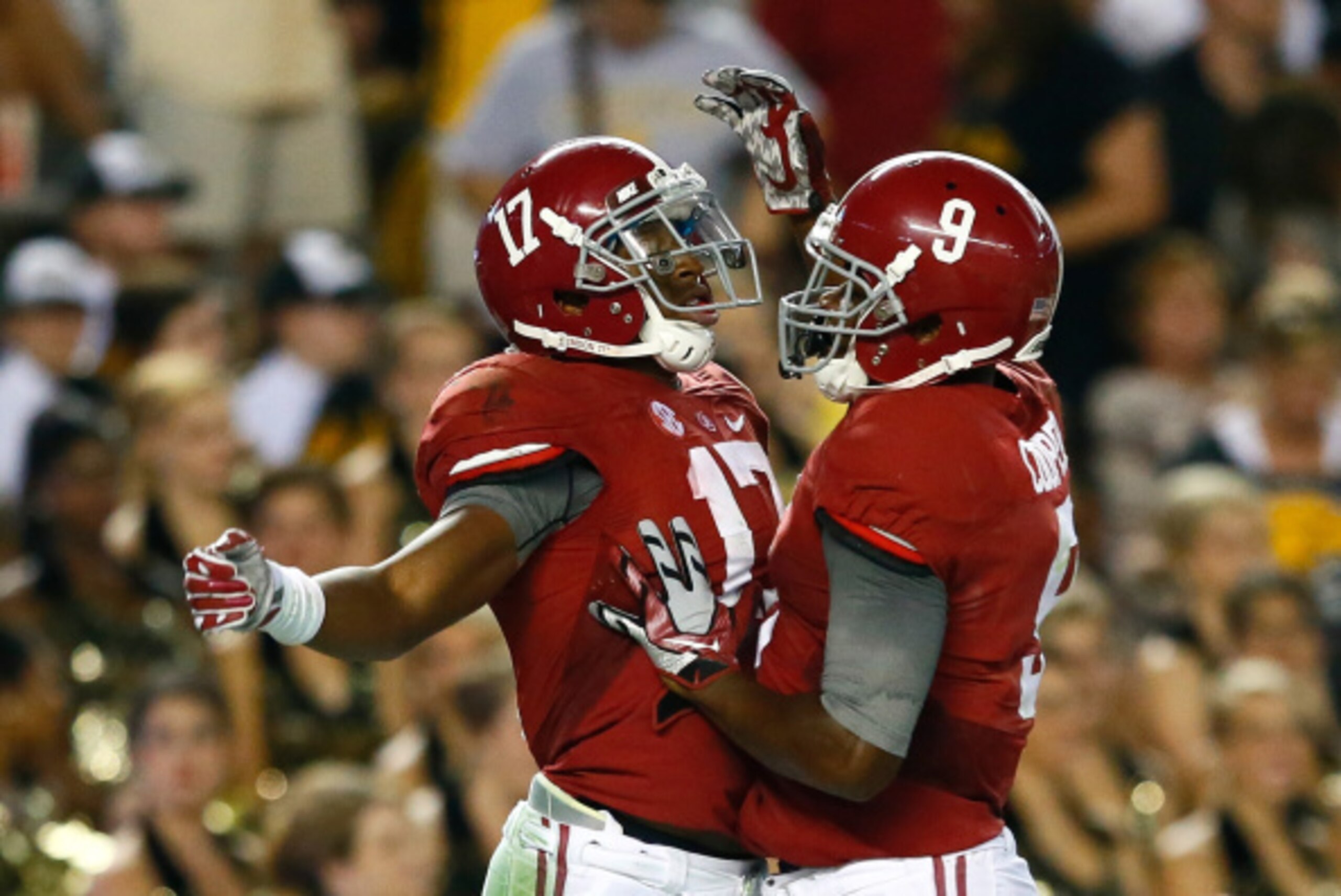 TUSCALOOSA, AL - SEPTEMBER 13:  Kenyan Drake #17 of the Alabama Crimson Tide celebrates his touchdown against the Southern Miss Golden Eagles with Amari Cooper #9 at Bryant-Denny Stadium on September 13, 2014 in Tuscaloosa, Alabama.  (Photo by Kevin C. Co