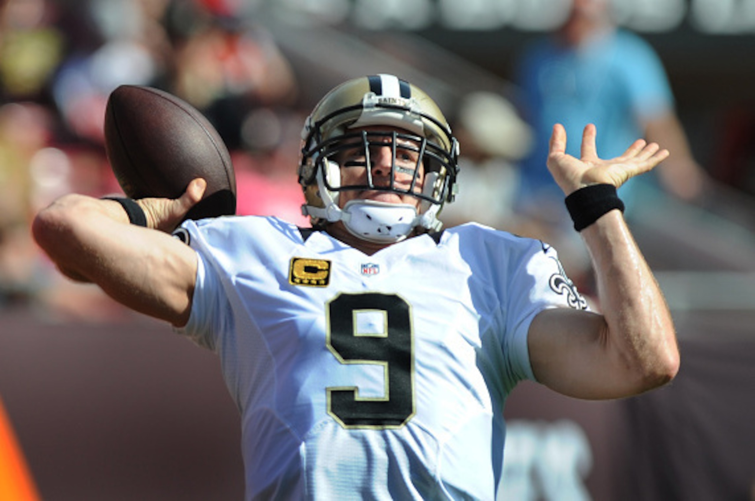 TAMPA, FL - DECEMBER 28: Quarterback Drew Brees #9 of the New Orleans Saints throws a pass during pregame warmups against the Tampa Bay Buccaneers at Raymond James Stadium on December 28, 2014 in Tampa, Florida. (Photo by Cliff McBride/Getty Images)