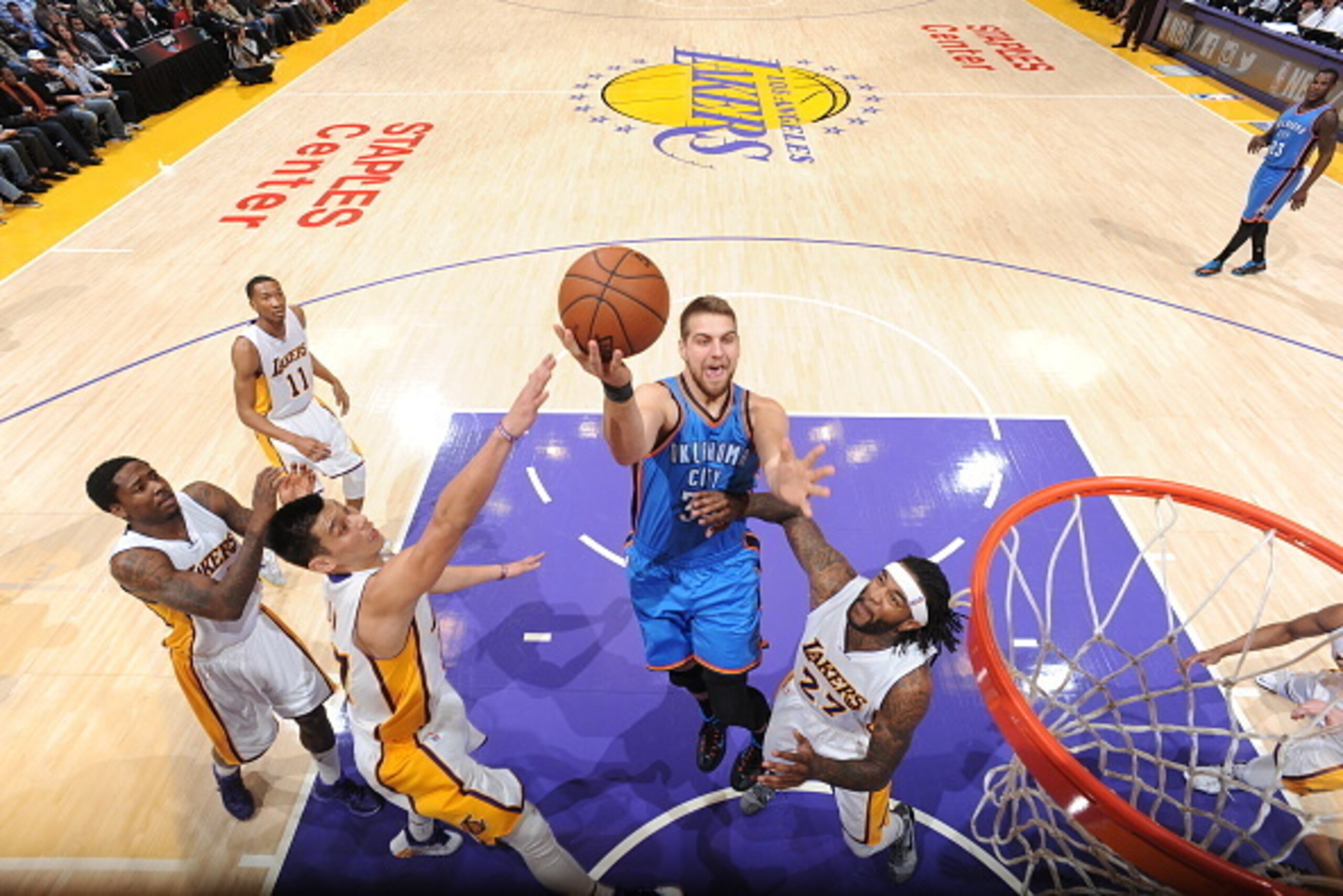 LOS ANGELES, CA - MARCH 1:  Mitch McGary #33 of the Oklahoma City Thunder goes to the basket against the Los Angeles Lakers on March 1, 2015 at Staples Center in Los Angeles, California. NOTE TO USER: User expressly acknowledges and agrees that, by downlo