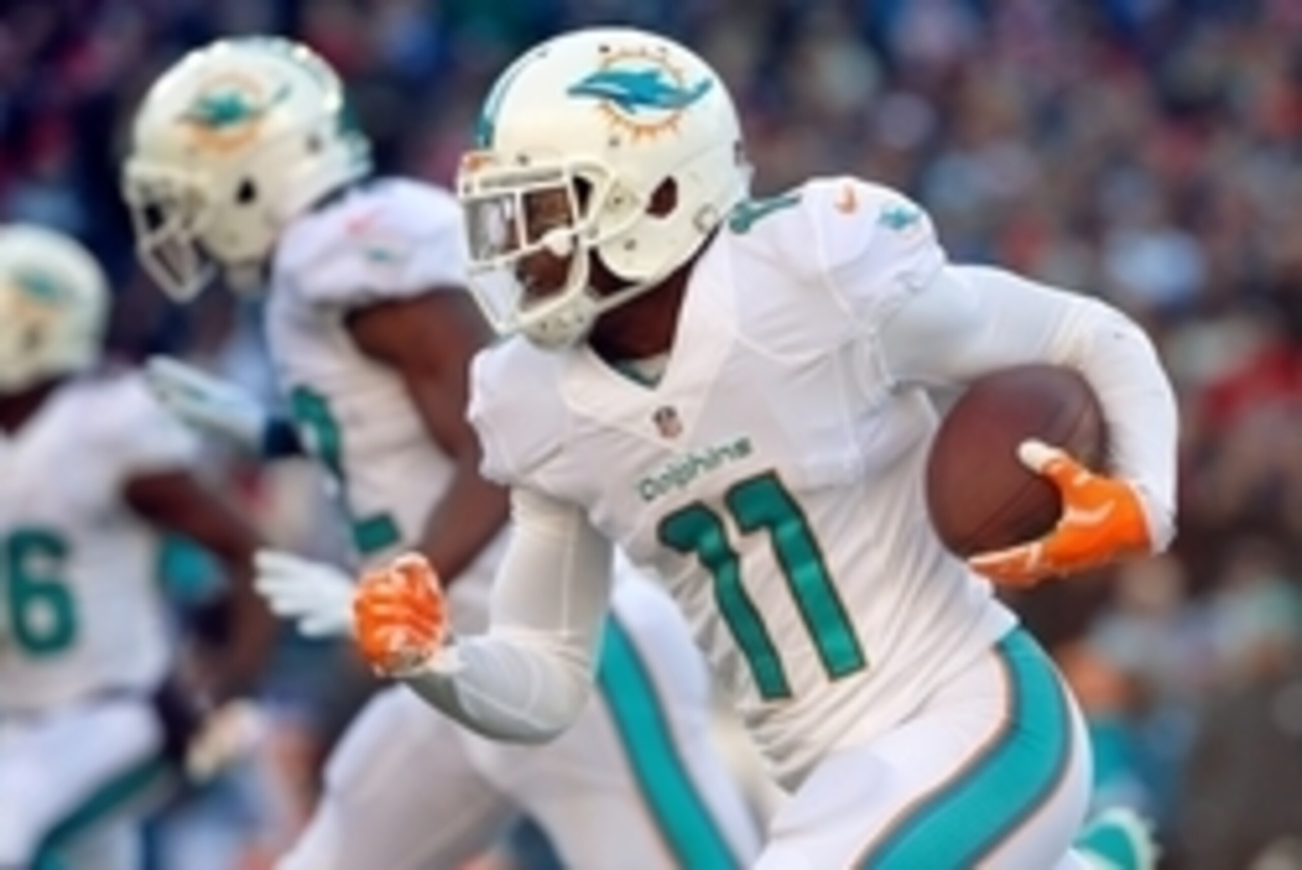 Dec 14, 2014; Foxborough, MA, USA; dMiami Dolphins wide receiver Mike Wallace (11) runs the ball against the New England Patriots during the first half at Gillette Stadium. Mandatory Credit: Winslow Townson-USA TODAY Sports