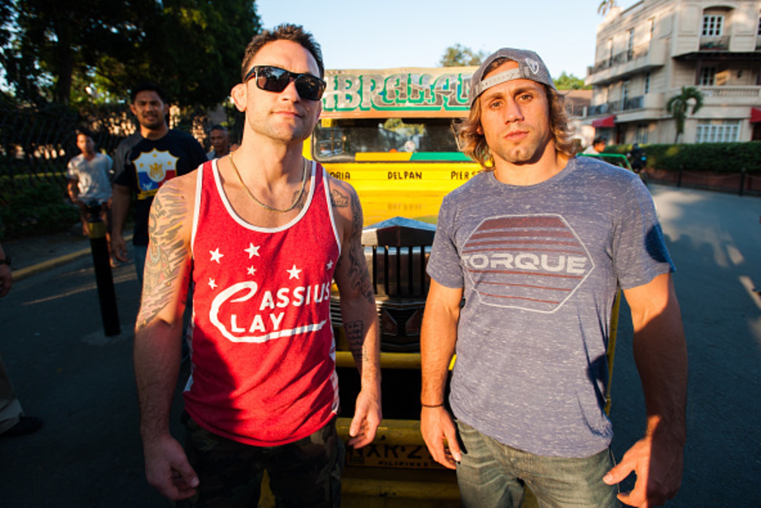 MANILA, PHILIPPINES - MARCH 10: UFC fighters Frankie Edgar and Uriah Faber stand in front of a jeepney during the UFC Manila Press Conference on March 10, 2015 in Manila, Philippines.  (Photo by Dondi Tawatao/Getty Images)