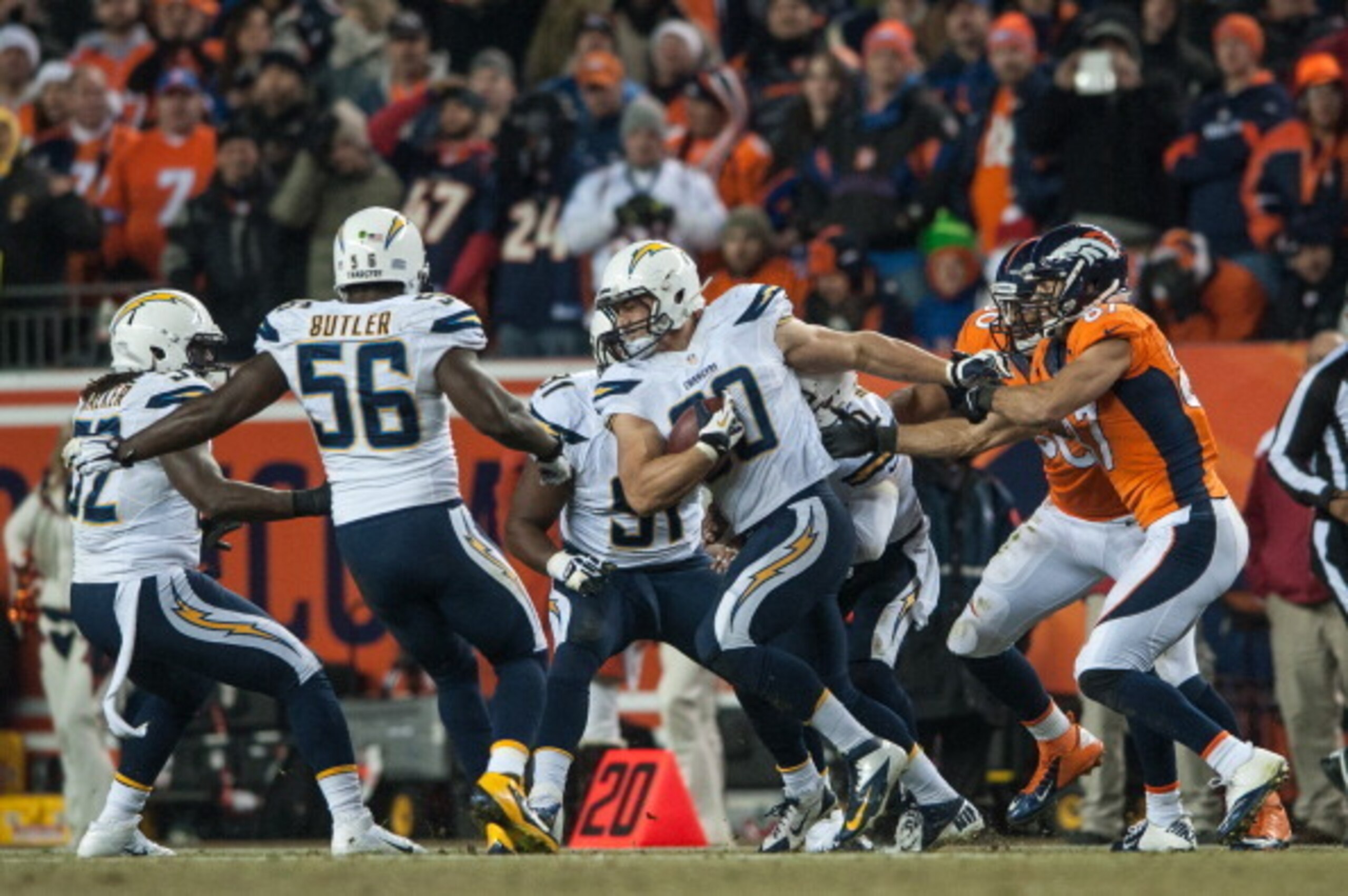DENVER, CO - DECEMBER 12:  Linebacker Thomas Keiser #90 of the San Diego Chargers has a fourth quarter interception against the Denver Broncos at Sports Authority Field Field at Mile High on December 12, 2013 in Denver, Colorado.  (Photo by Dustin Bradfor