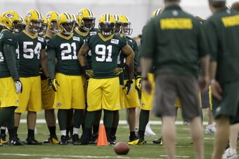 GREEN BAY, WI - MAY 16: Carl Bradford #91 of the Green Bay Packers runs through drills during rookie mini camp at Don Hudson Center on May 16, 2014 in Green Bay, Wisconsin. (Photo by Mike McGinnis/Getty Images)