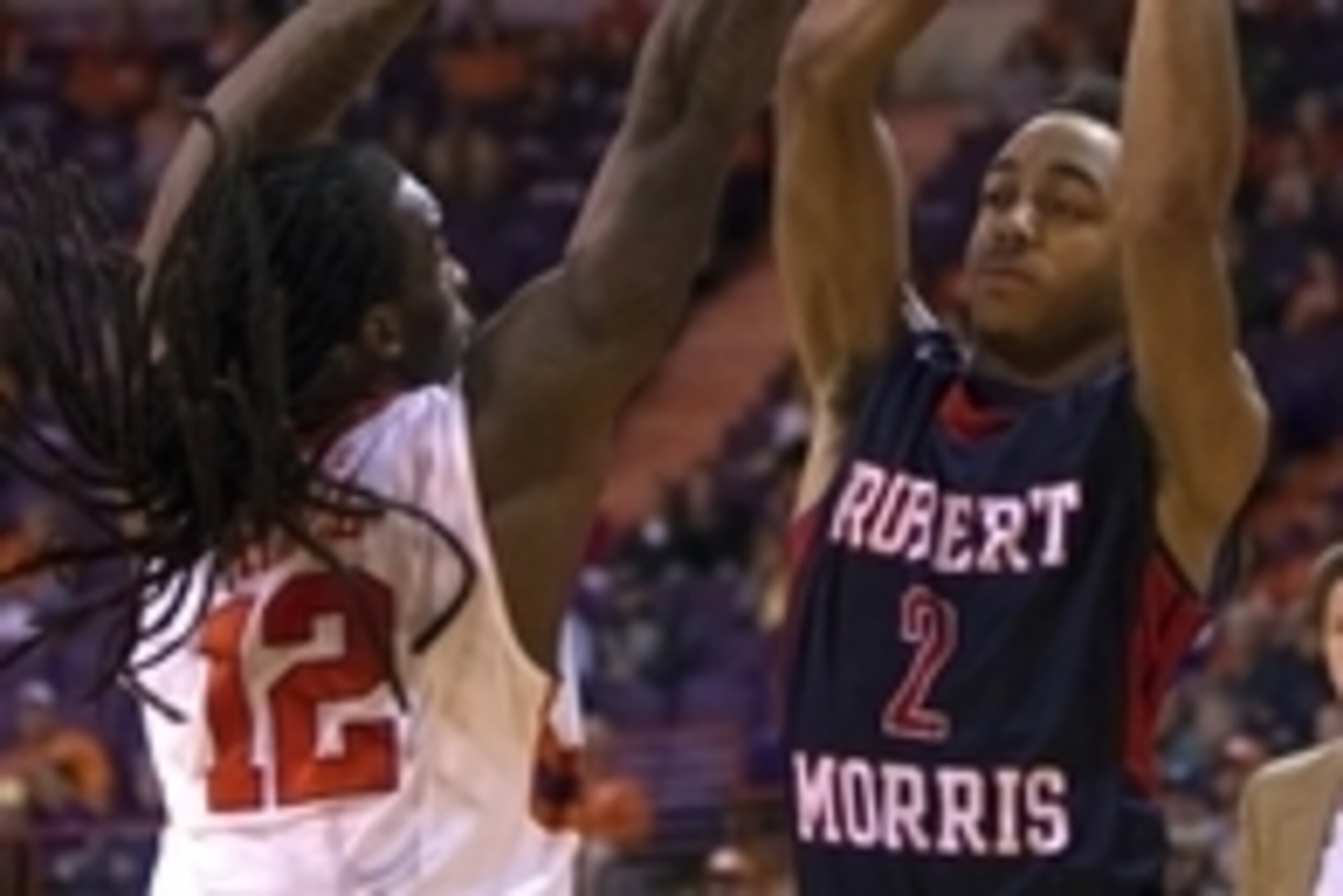 Dec 30, 2014; Clemson, SC, USA; Robert Morris Colonials guard Marcquise Reed (2) attempts to shoot the ball while being defended by Clemson Tigers guard Rod Hall (12) during the first half at Littlejohn Coliseum. Mandatory Credit: Joshua S. Kelly-USA TODA