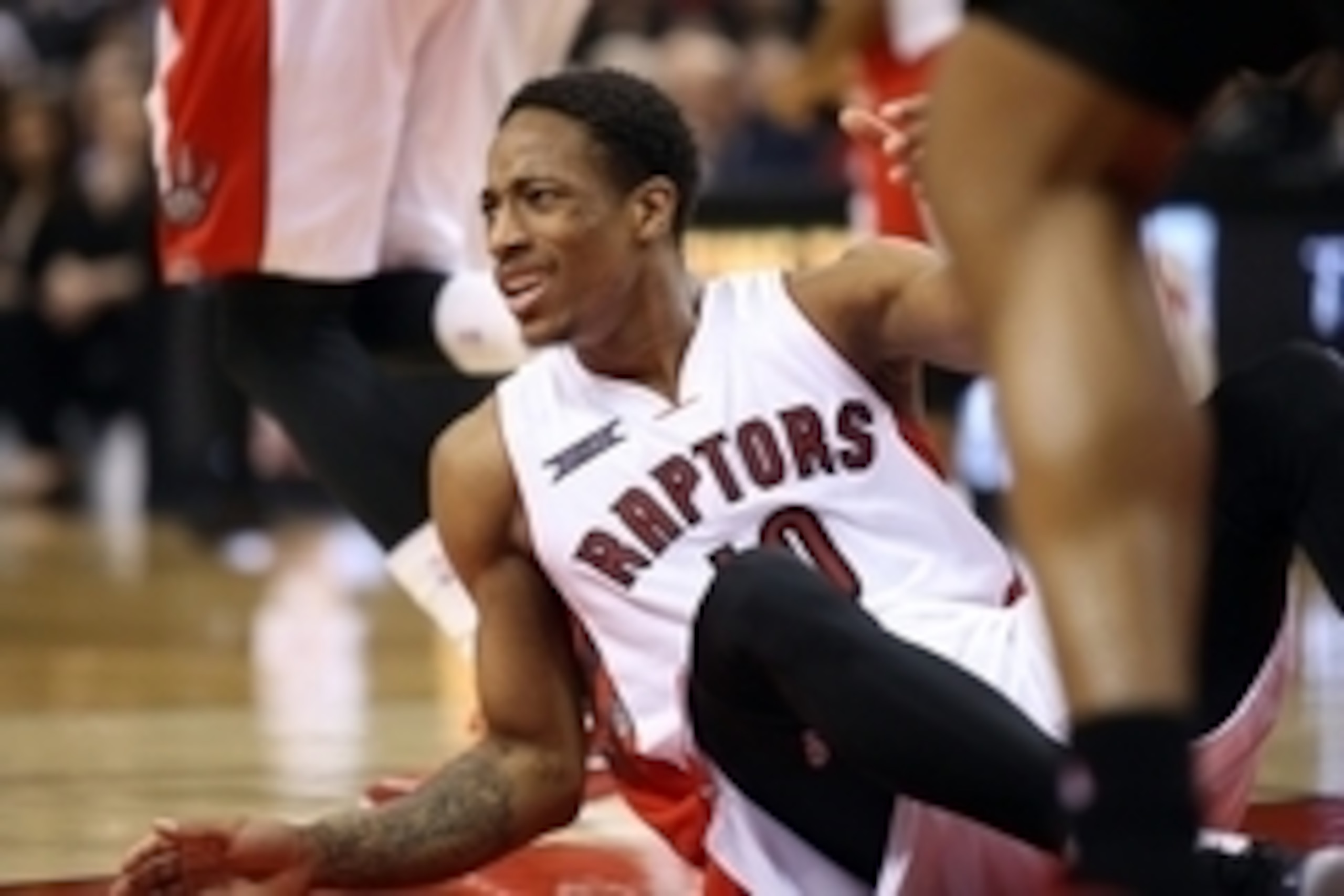 Mar 15, 2015; Toronto, Ontario, CAN; Toronto Raptors guard DeMar DeRozan (10) reacts to a non-call during their game against the Portland Trail Blazers at Air Canada Canada Centre. The Trail Blazers beat the Raptors 113-97. Mandatory Credit: Tom Szczerbow
